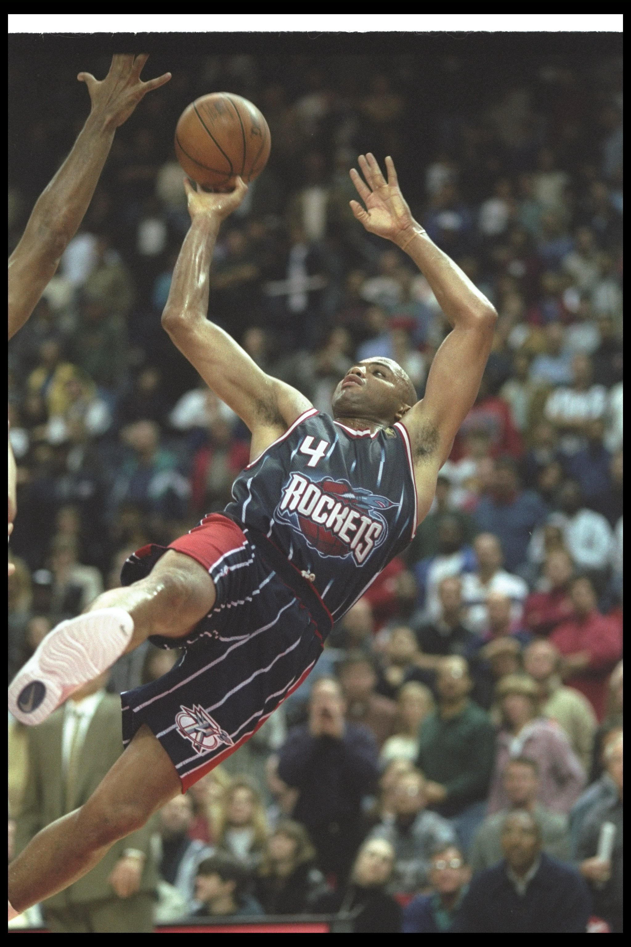 30 Nov 1996:  Forward Charles Barkley of the Houston Rockets moves the ball during a game against the Washington Bullets at the USAir Arena in Landover, Maryland.  The Rockets won the game, 103-99.     Mandatory Credit: Doug Pensinger  /Allsport