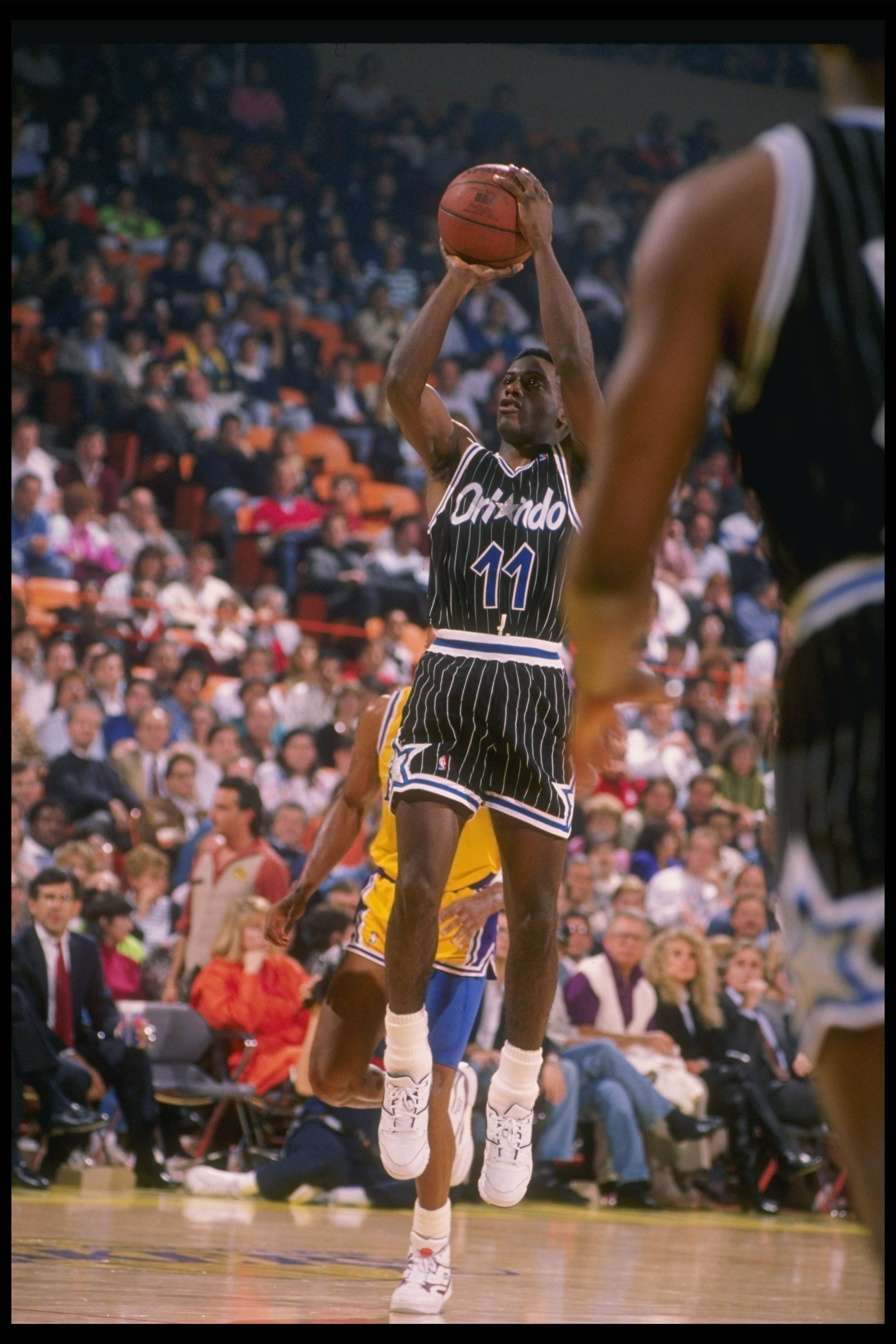 1990:  Jay Vincent of the Orlando Magic shoots the ball during a game against the Los Angeles Lakers at the Great Western Forum in Inglewood, California.   Mandatory Credit: Ken Levine  /Allsport