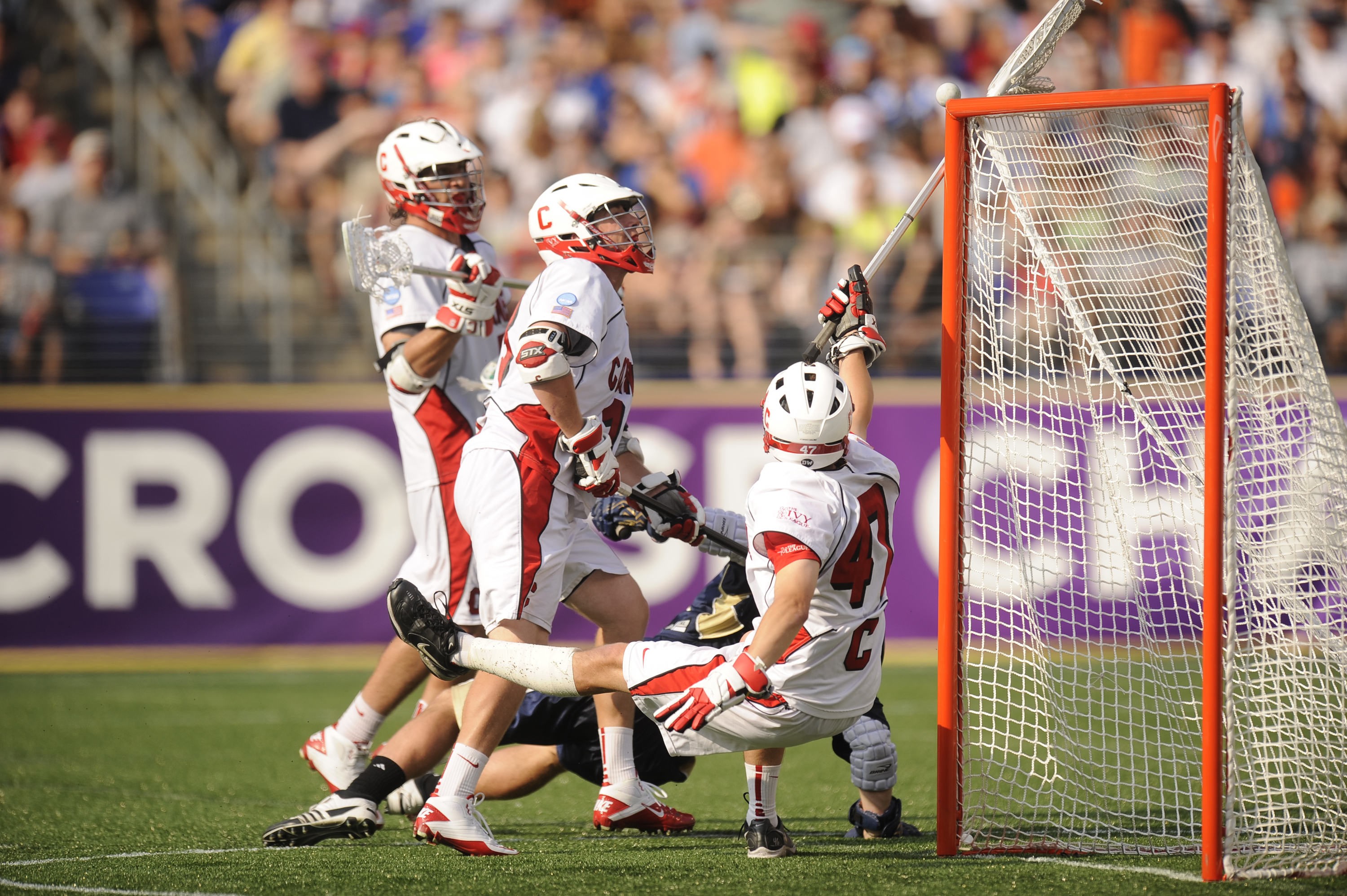 BALTIMORE, MD - MAY 29:  AJ Fiore #47 of the Cornell Big Red makes a save against the Notre Dame Fighting Irish during the 2010 NCAA Division 1 Lacrosse Semifinal Championship game on May 29, 2010 at M & T Bank Stadium in Baltimore, Maryland.  (Photo by M