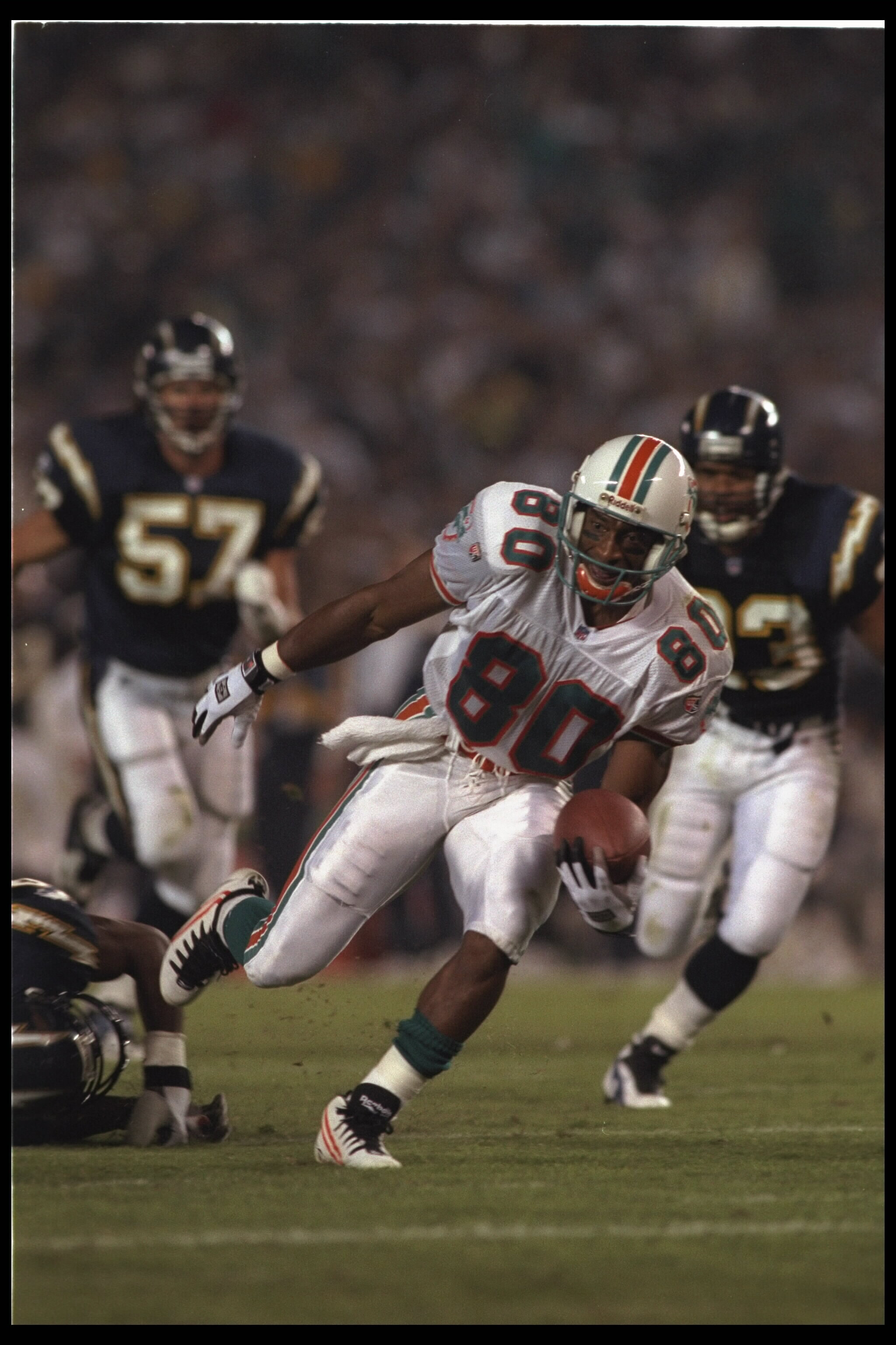 5 Nov 1995:  Wide receiver Irving Fryar #80 of the Miami Dolphins makes his way down field for a touchdown against the San Diego Chargers at Jack Murphy Stadium in San Diego, California.  The Dolphins defeated the Chargers 24-14.  Mandatory Credit:  Allsp