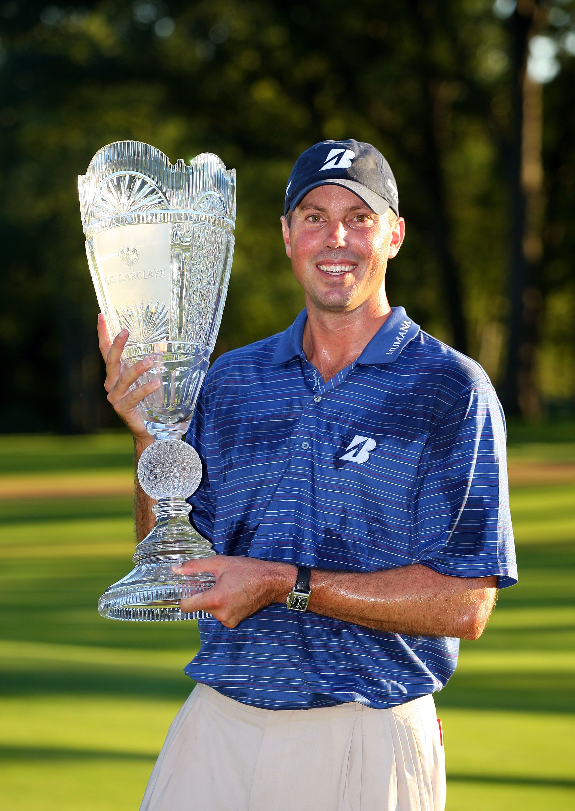 PARAMUS, NJ - AUGUST 29:  Matt Kuchar poses with the trophy after winning The Barclays at the Ridgewood Country Club on August 29, 2010 in Paramus, New Jersey. Kuchar won on a one hole playoff.  (Photo by Hunter Martin/Getty Images)