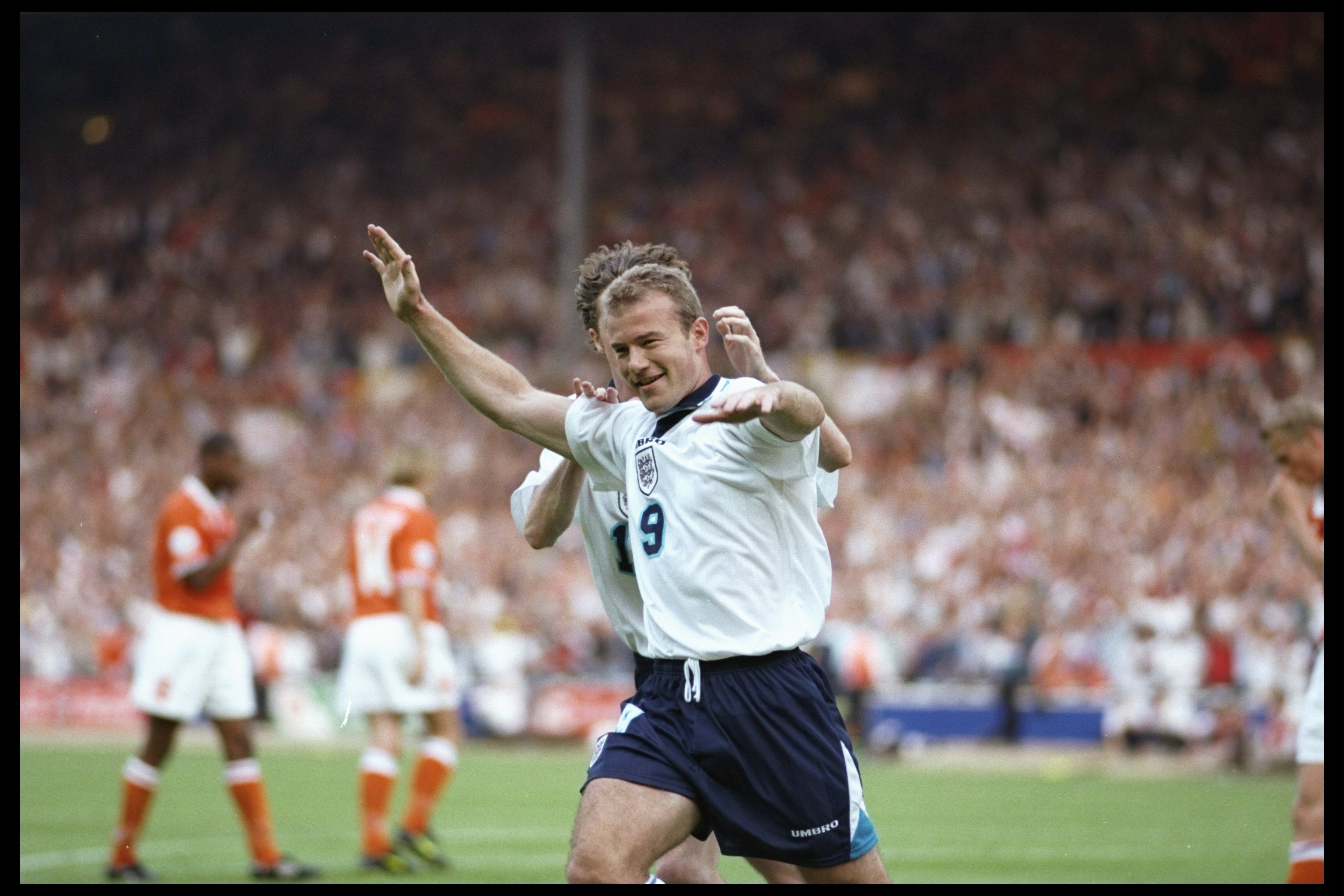18 Jun 1996:  Alan Shearer of England celebrates his second and England's third goal against Holland in the Group A match at Wembley during the European Football Championships. England beat Holland 4-1.