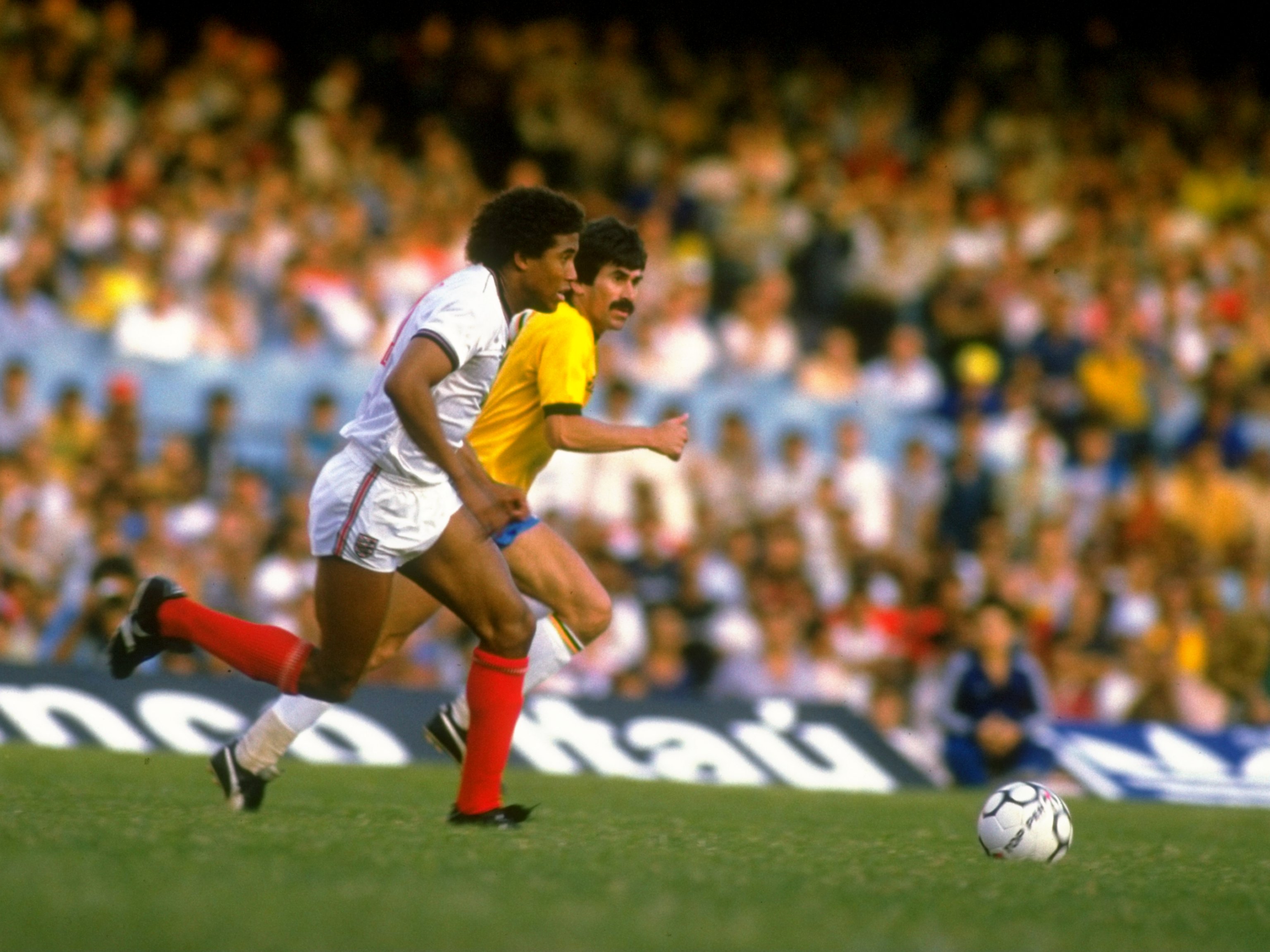 1984:  John Barnes of England starts a run on the goal during the international match against Brazil played at the Maracana Stadium in Rio de Janeiro, Brazil. England won the match 2-0. \ Mandatory Credit: David  Cannon/Allsport