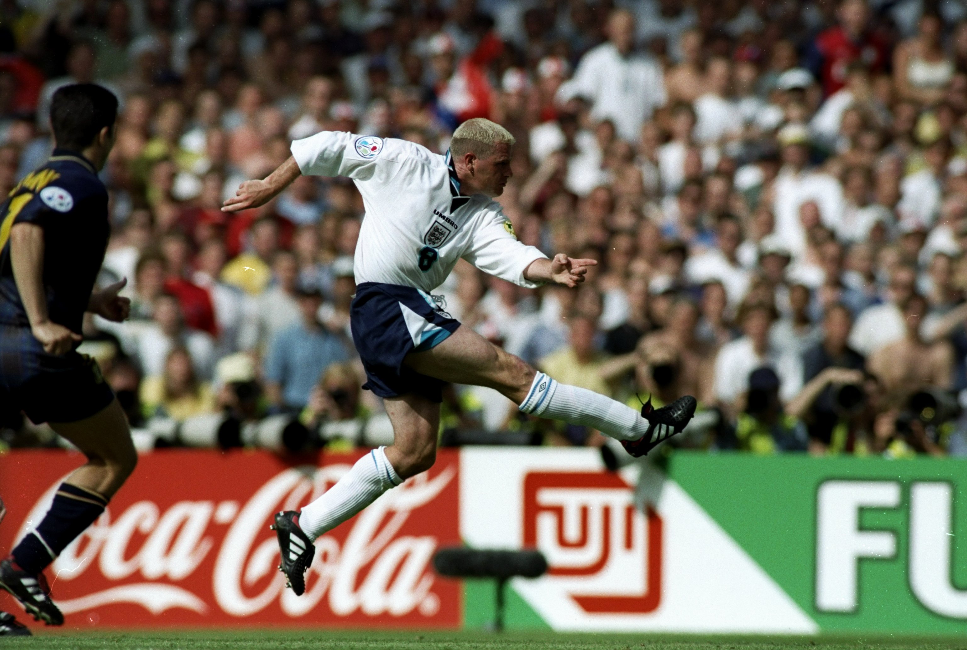 15 Jun 1996:  Paul Gascoigne of England scores their second goal during the European Championship match against Scotland at Wembley Stadium in London. England won the match 2-0. \ Mandatory Credit: Stu  Forster/Allsport