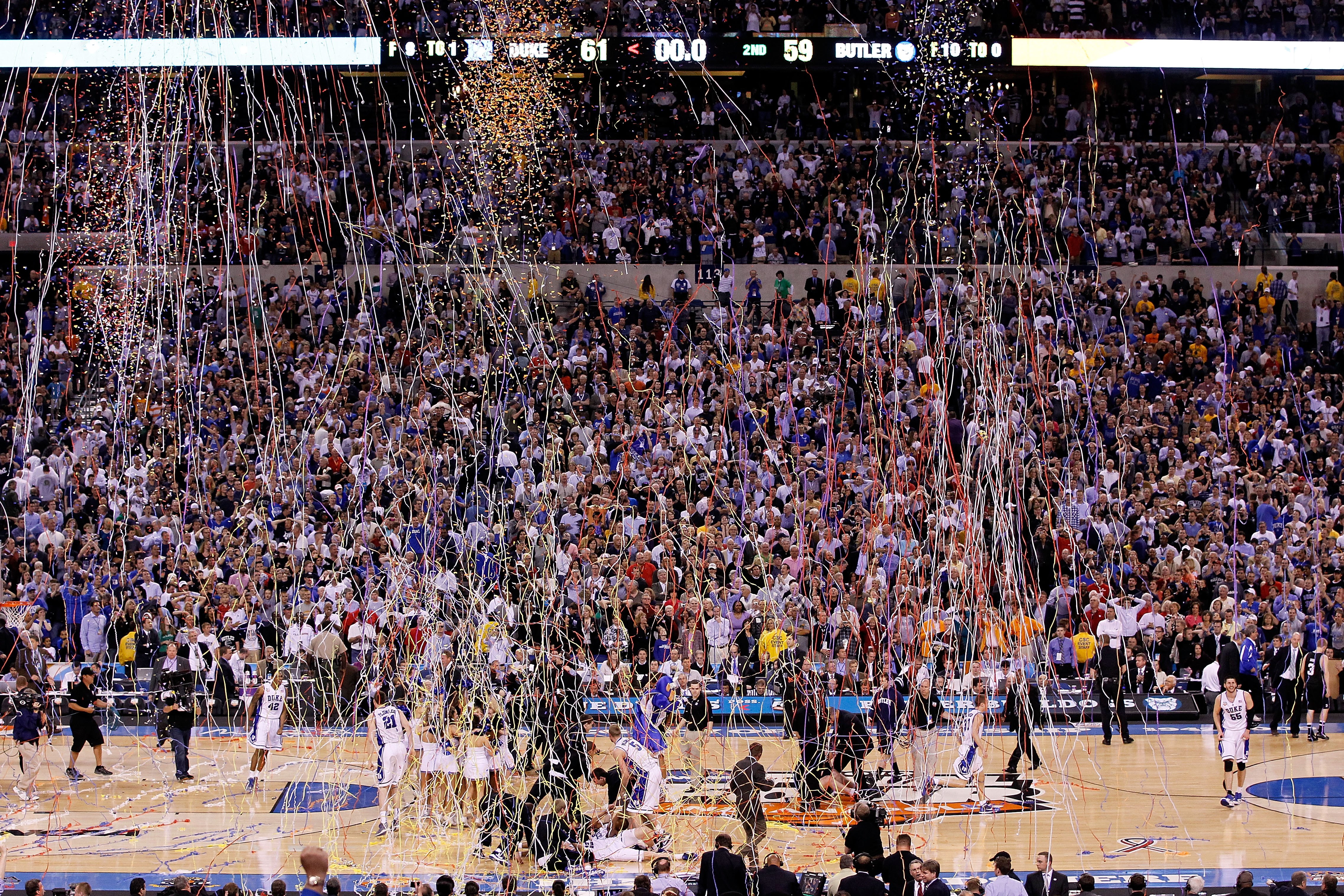 INDIANAPOLIS - APRIL 05:  Confetti falls as the Duke Blue Devils celebrate after they won 61-59 against the Butler Bulldogs during the 2010 NCAA Division I Men's Basketball National Championship game at Lucas Oil Stadium on April 5, 2010 in Indianapolis,
