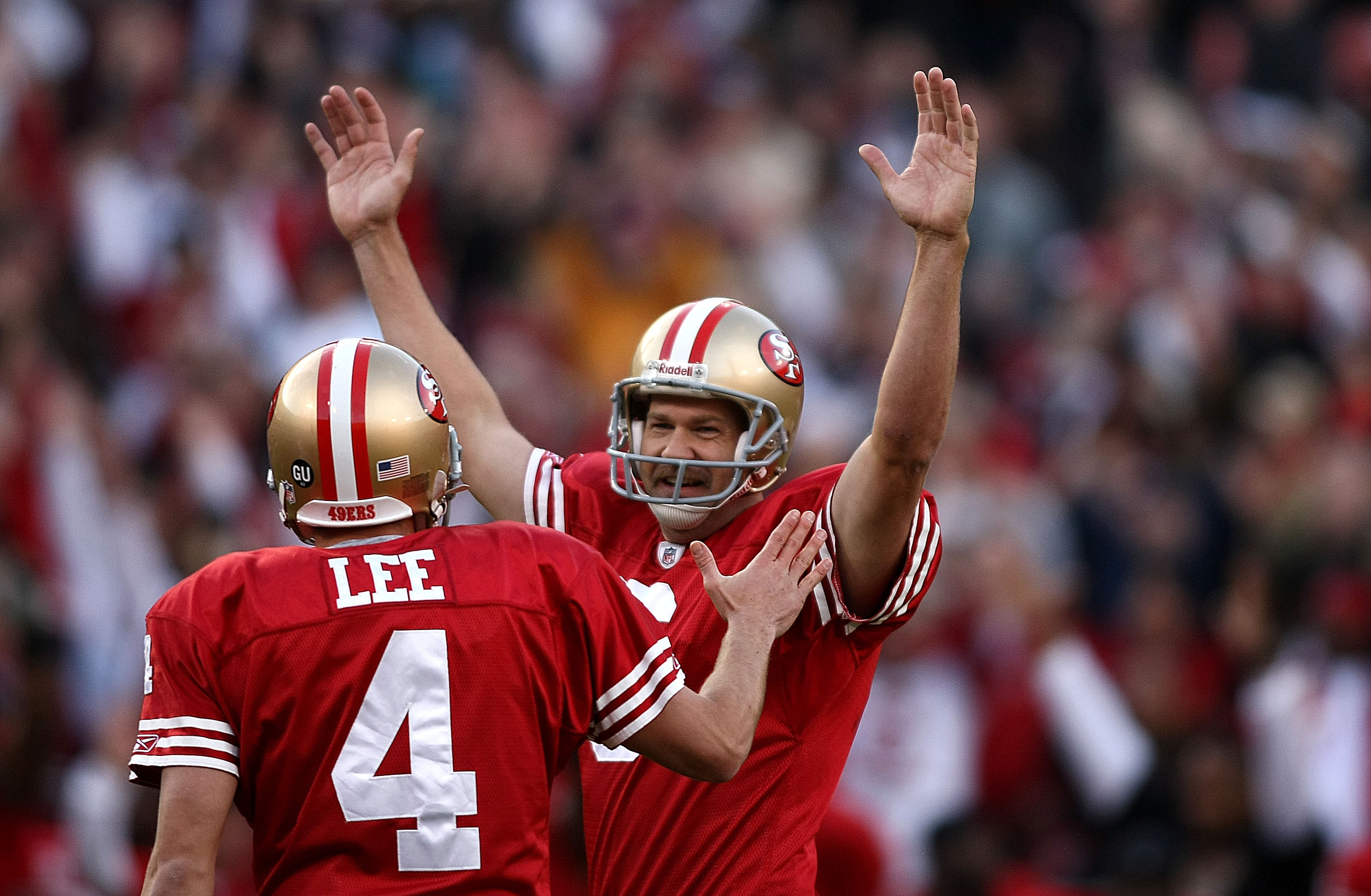 Kicker Joe Nedney and holder Andy Lee of the San Francisco 49ers