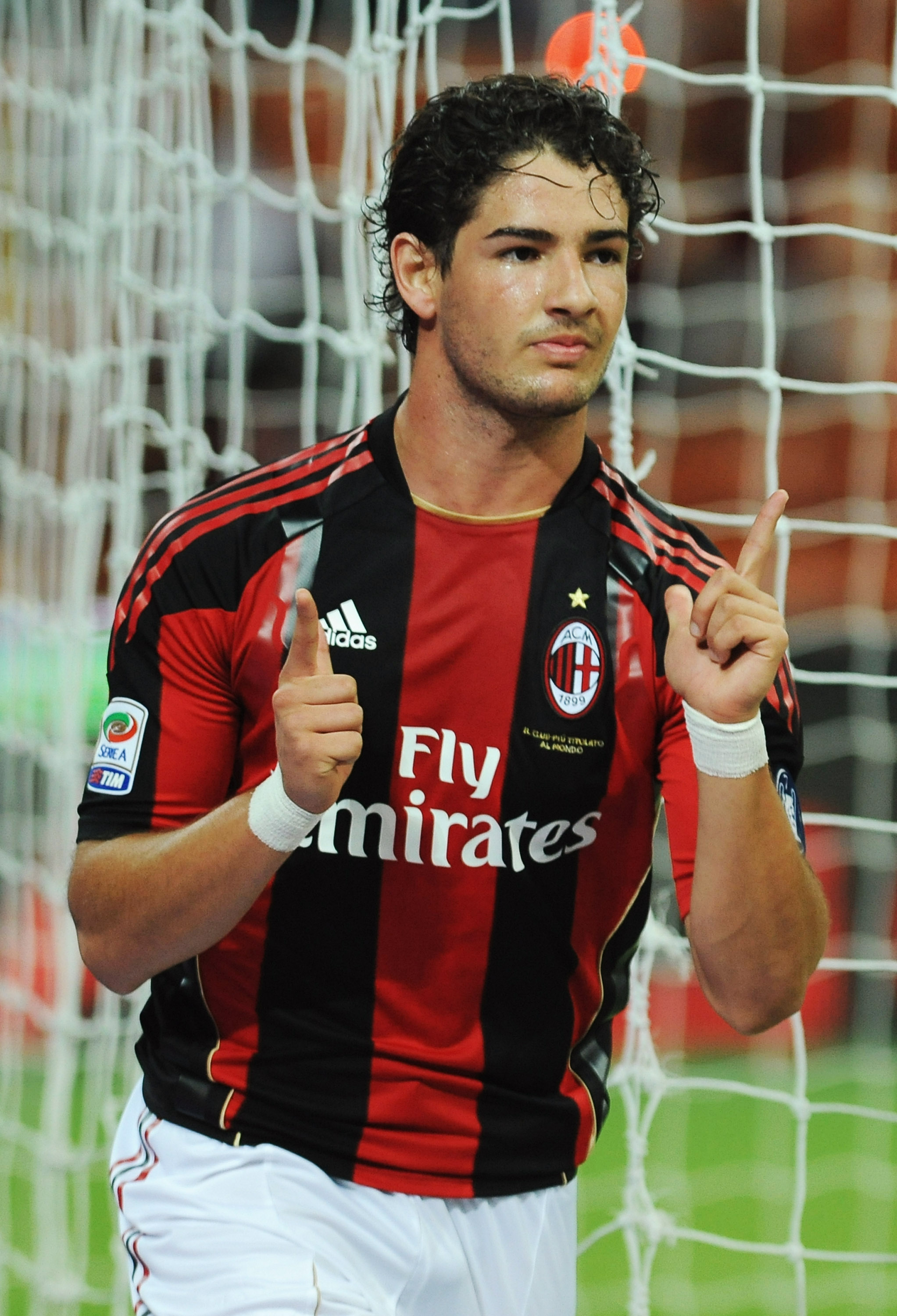 Pato celebrates one of his two goals against Lecce on opening night.