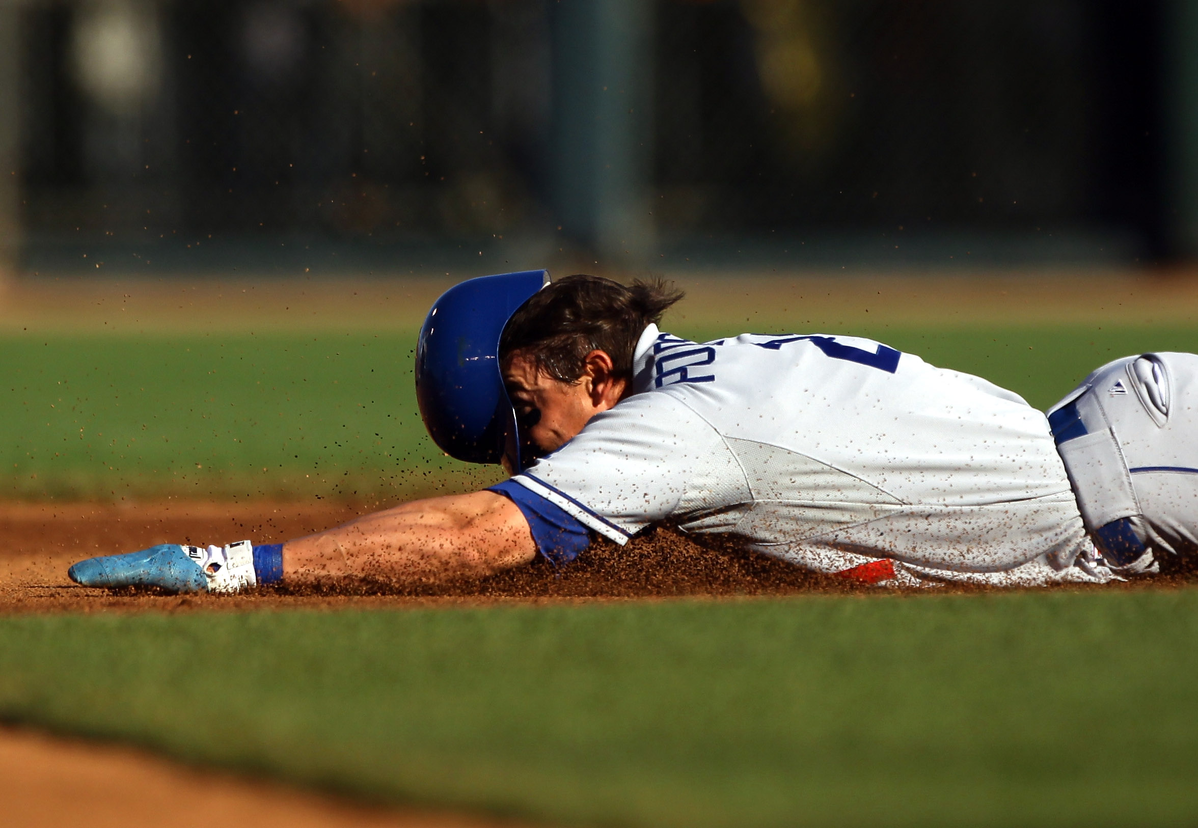 SAN FRANCISCO - AUGUST 01:  Scott Podsednik #21 of the Los Angeles Dodgers slides into second base during their game against the San Francisco Giants at AT&T Park on August 1, 2010 in San Francisco, California.  (Photo by Ezra Shaw/Getty Images)