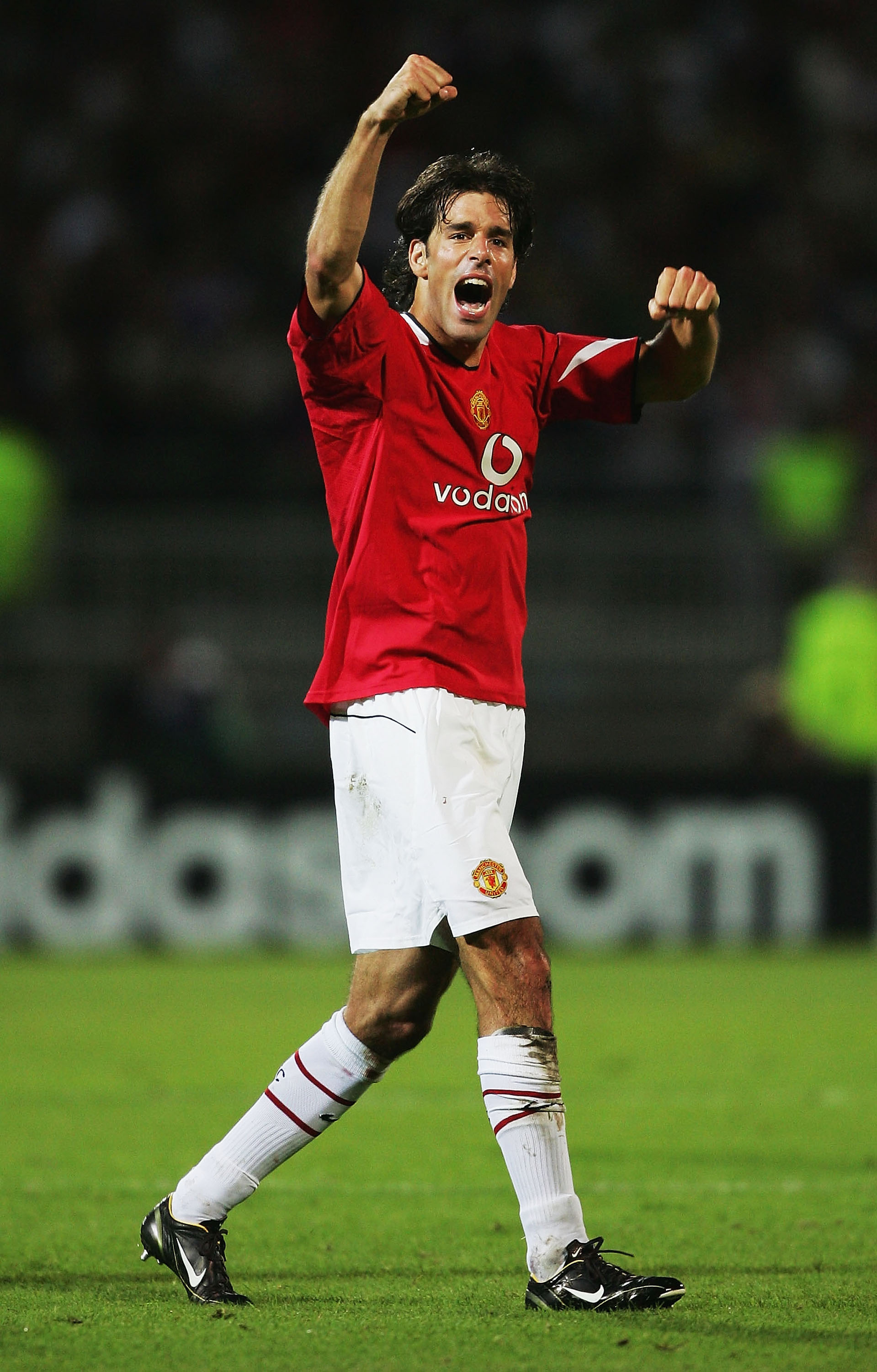 LYON, FRANCE - SEPTEMBER 15:  Ruud van Nistelrooy of Manchester United celebrates scoring their first goal during the UEFA Champions League Group D match between Olympique Lyonnais and Manchester United at the Municipal de Garland Stadium on September 15,