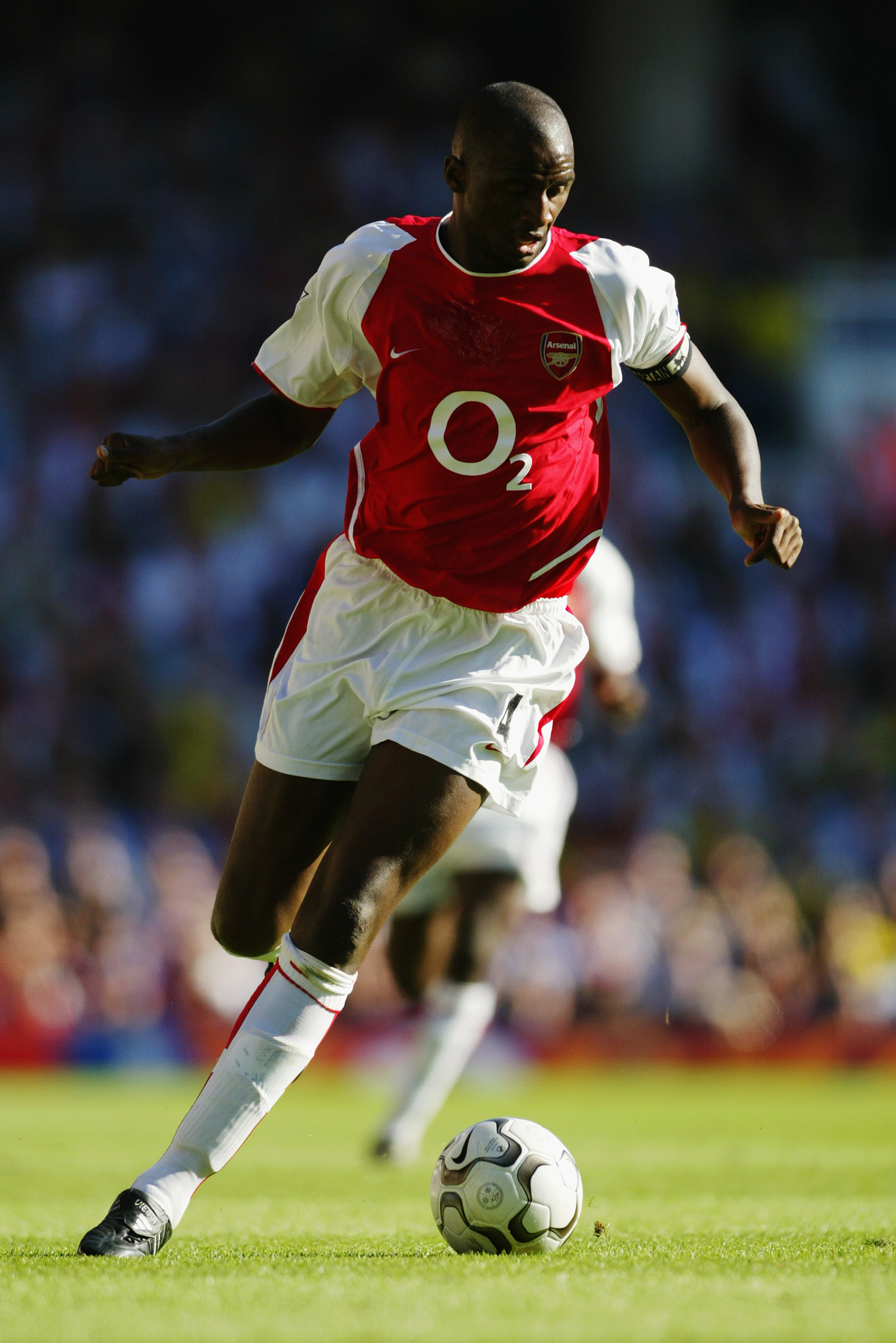 LONDON - SEPTEMBER 13:  Patrick Vieira of Arsenal running with the ball during the FA Barclaycard Premiership match between Arsenal and Portsmouth on September 13, 2003 at Highbury on September 13, 2003 in London, England. The match ended in a 1-1 draw. (