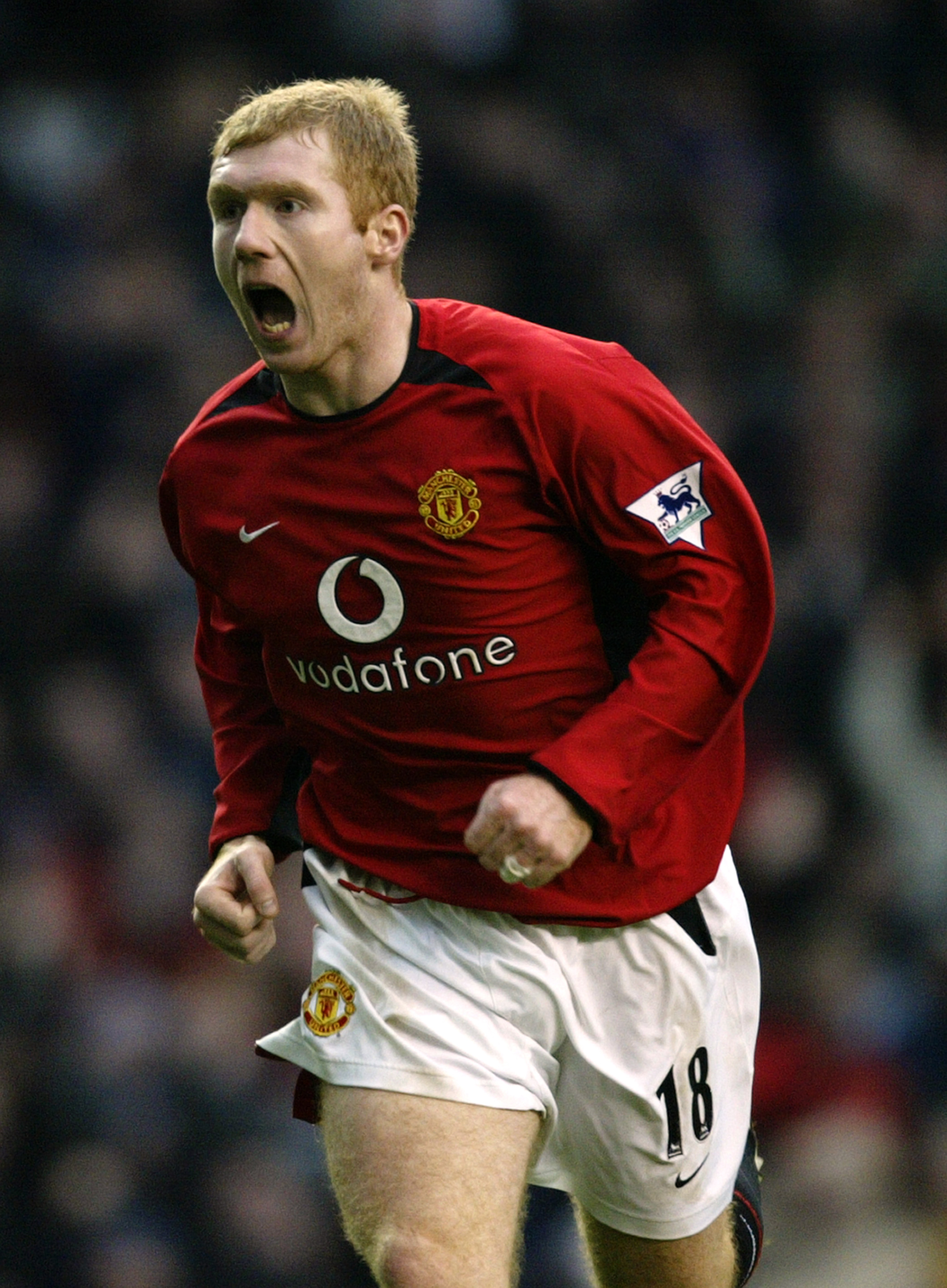 MANCHESTER - DECEMBER 7:  Paul Scholes of Man Utd celebrates after scoring the second goal during the Manchester United v Arsenal FA Barclaycard Premiership match at Old Trafford on December 7, 2002 in Manchester, England. (Photo by Alex Livesey/Getty Ima