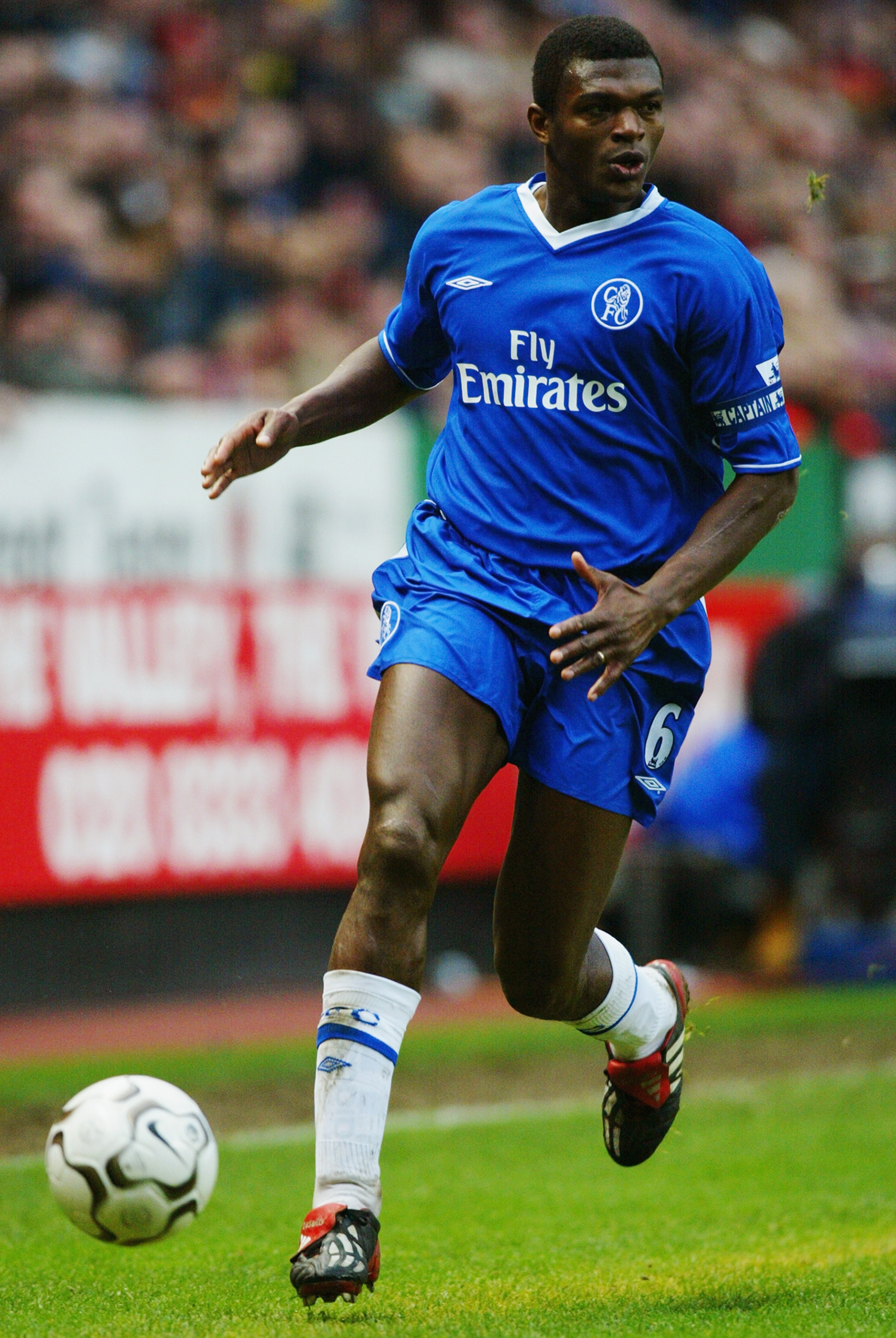LONDON - DECEMBER 26:  Marcel Desailly of Chelsea running with the ball during the FA Barclaycard Premiership match between Charlton Athletic and Chelsea on December 26, 2003 at The Valley in London, England.  Charlton Athletic won the match 4-2.  (Photo