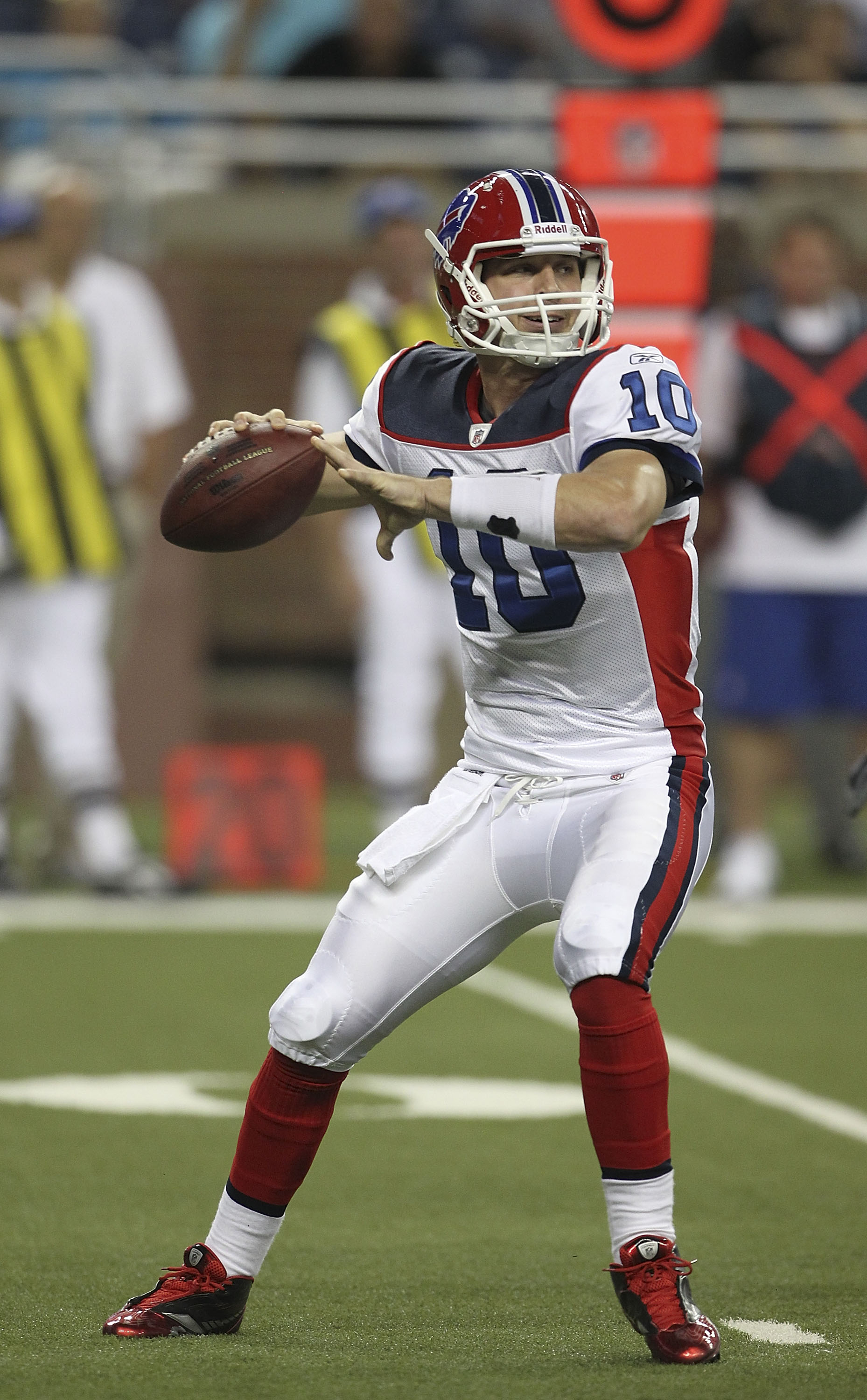 Minnesota Vikings kicker Rhys Lloyd struggles to put on his helmet