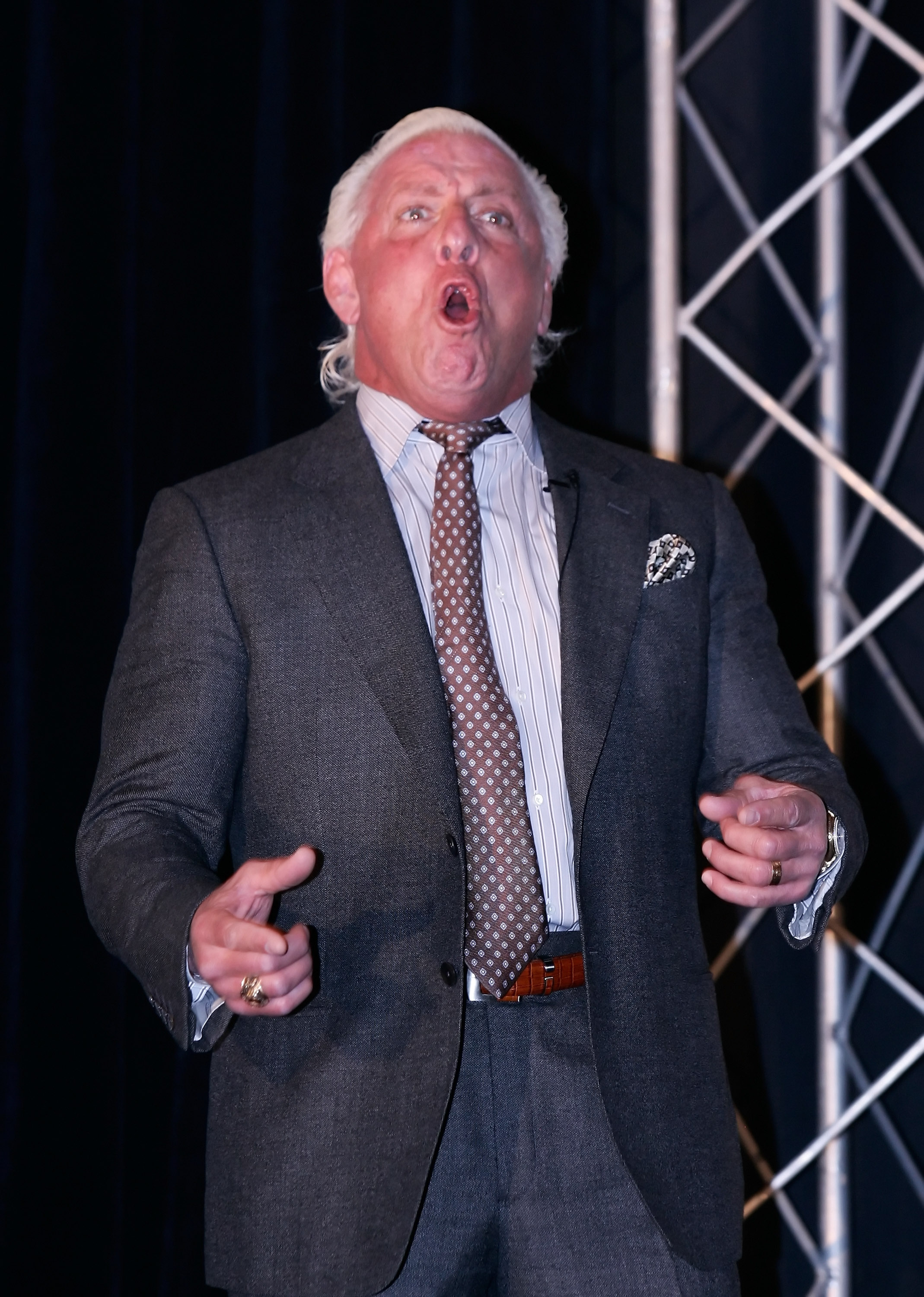 CONCORD, NC - JANUARY 20:  Former American Professional Wrestler Ric Flair performs his famous yell 'Wooooo!', for the media during the NASCAR Sprint Media Tour hosted by Charlotte Motor Speedway, held at the Embassy Suites, on January 20, 2010 in Concord