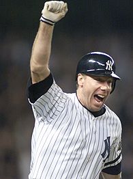 Scott Brosius of the New York Yankees reacts after hitting a