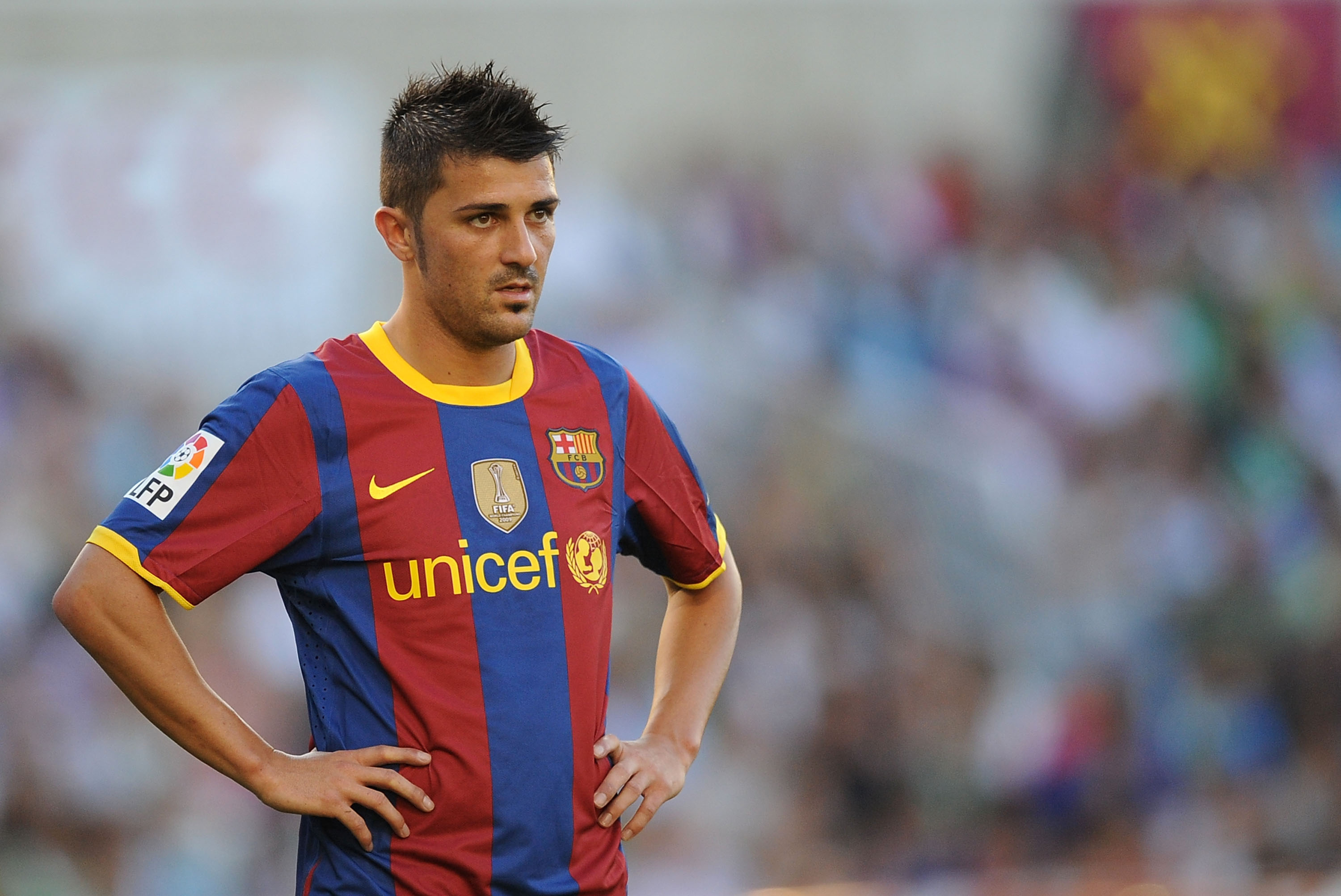 SANTANDER, SPAIN - AUGUST 29:  David Villa of Barcelona waits for play to resume during the La Liga match between Racing Santander and Barcelona at El Sardinero stadium on August 29, 2010 in Santander, Spain. (Photo by Denis Doyle/Getty Images)