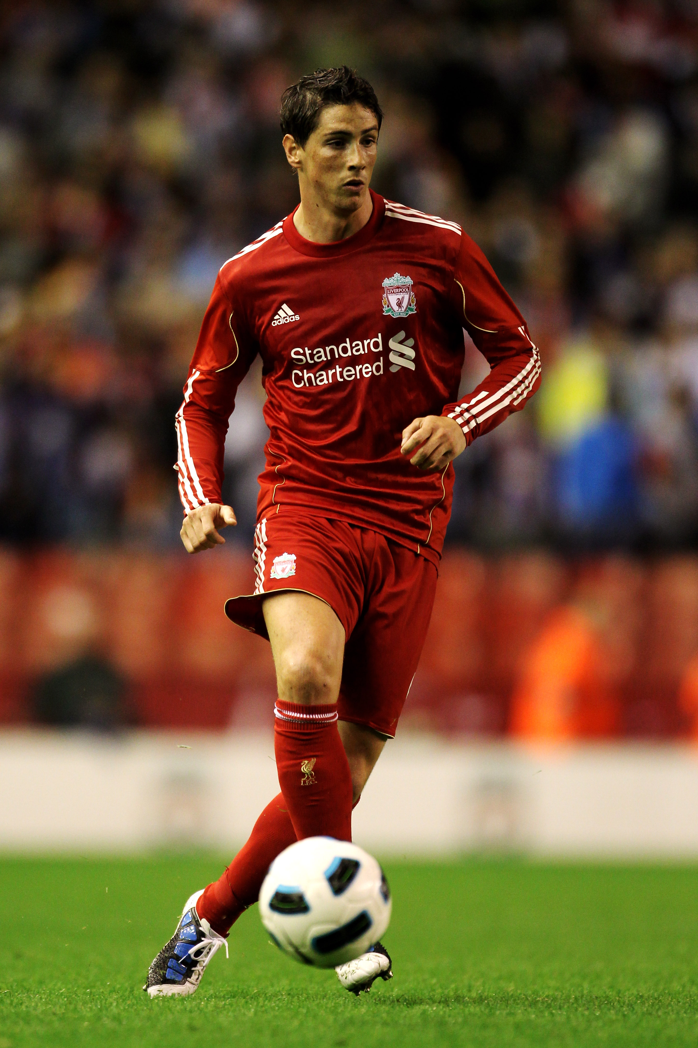 LIVERPOOL, ENGLAND - AUGUST 19:  Fernando Torres of Liverpool in action during the UEFA Europa League play-off first leg match beteween Liverpool and Trabzonspor at Anfield on August 19, 2010 in Liverpool, England.  (Photo by Alex Livesey/Getty Images)