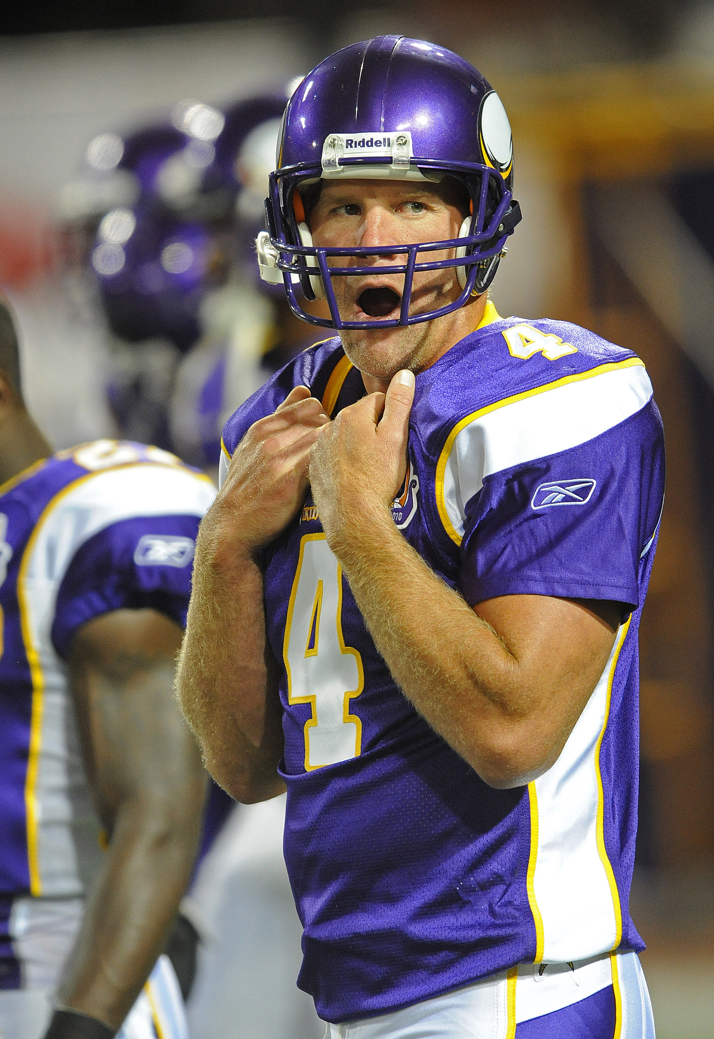 MINNEAPOLIS - SEPTEMBER 02:  Brett Favre #4 of the Minnesota Vikings yawns during warmups prior to an NFL preseason game against the Denver Broncos at the Mall of America Field at Hubert H. Humphrey Metrodome, on September 2, 2010 in Minneapolis, Minnesot