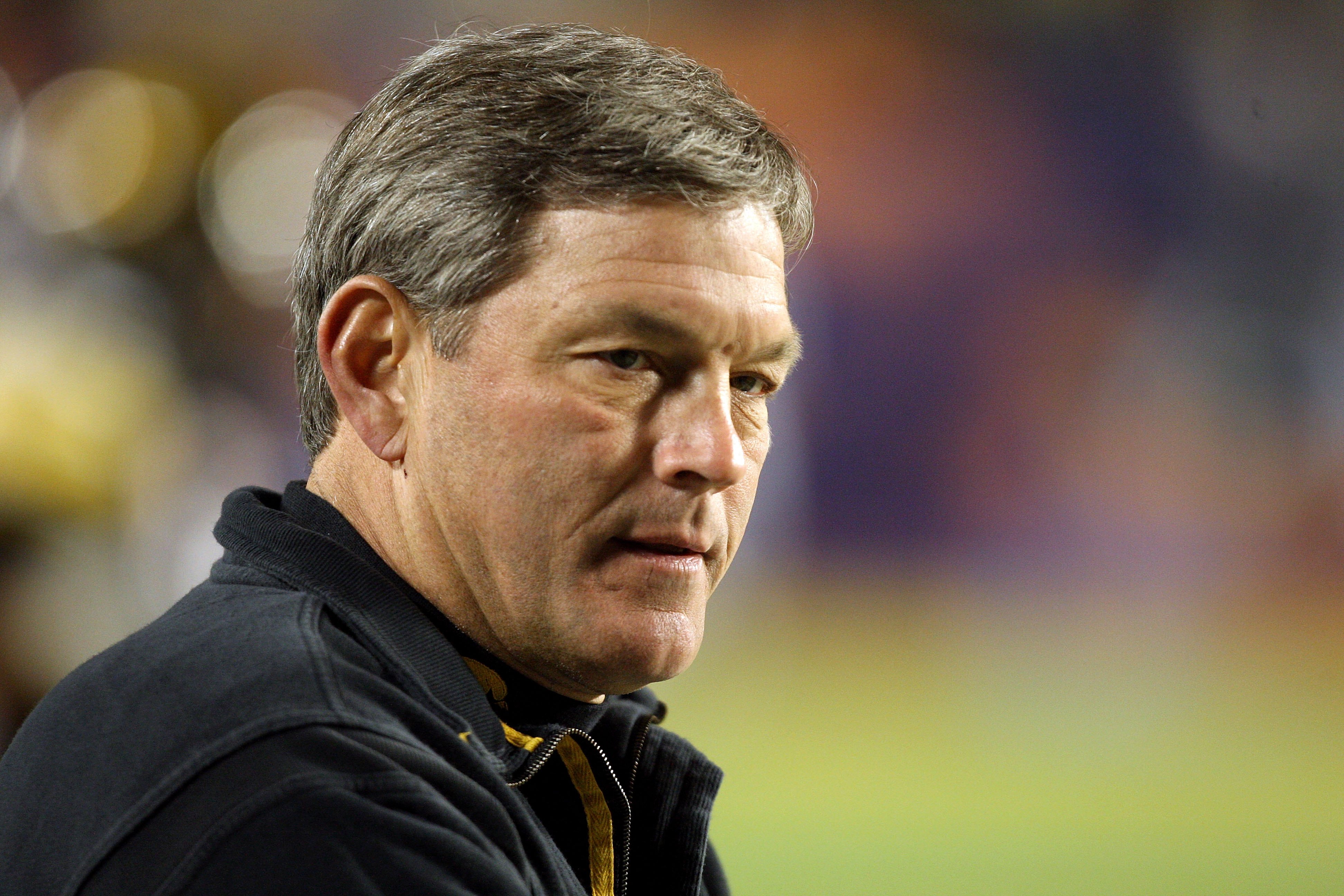 MIAMI GARDENS, FL - JANUARY 05: Head coach Kirk Ferentz of the Iowa Hawkeyes looks on during warm ups against the Georgia Tech Yellow Jackets during the FedEx Orange Bowl at Land Shark Stadium on January 5, 2010 in Miami Gardens, Florida. Iowa won 24-14.