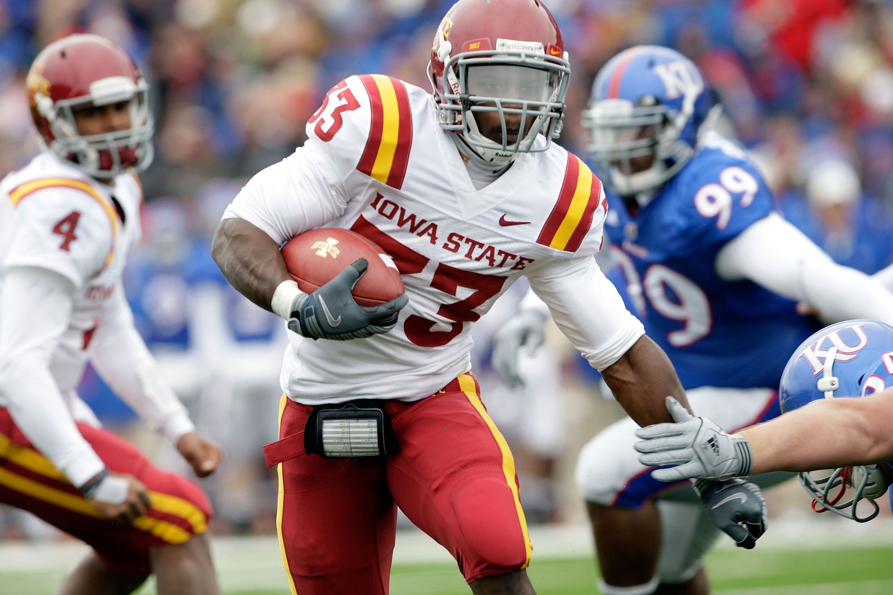 LAWRENCE, KS - OCTOBER 10: Running back Alexander Robinson #33 of the Iowa State Cyclones carries the ball during the game against the Kansas Jayhawks on October 10, 2009 at Memorial Stadium in Lawrence, Kansas. (Photo by Jamie Squire/Getty Images)