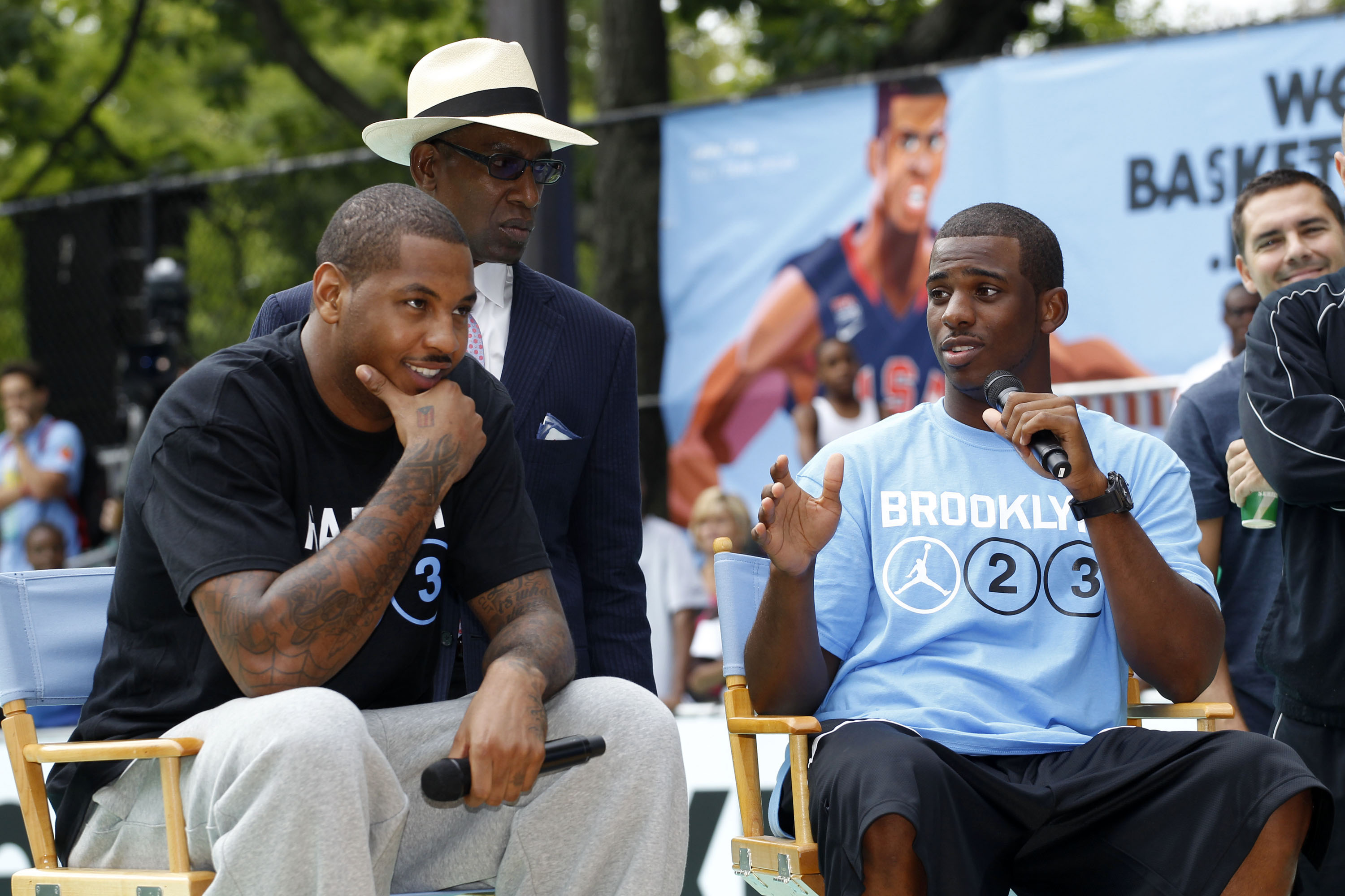 NEW YORK CITY, NY - AUGUST 13: Carmelo Anthony (L) and Chris Paul of USAB speak during the World Basketball Festival at Rucker Park on August 13, 2010 in New York City.  (Photo by Chris Trotman/Getty Images for Nike)