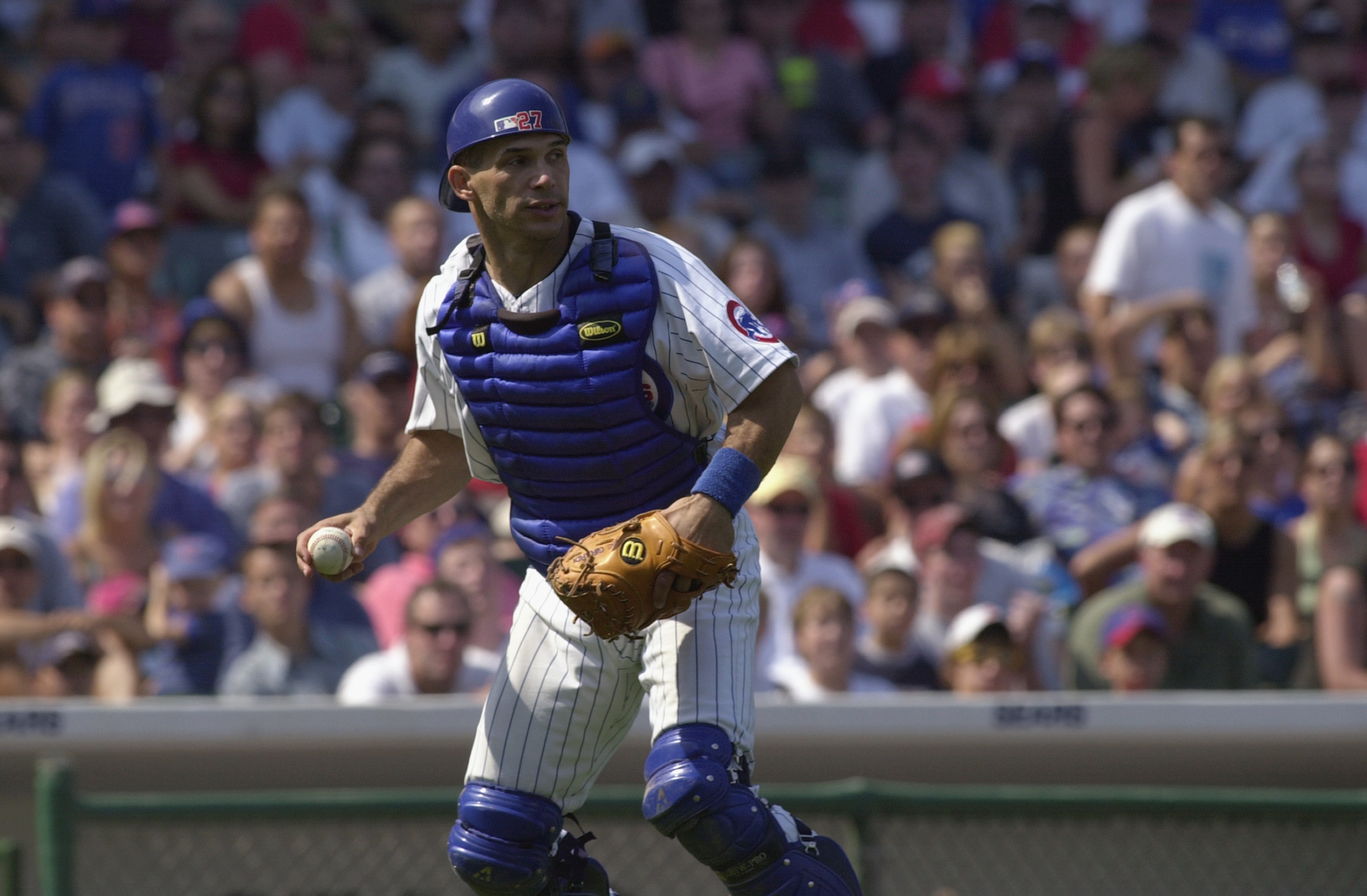 CHICAG0, IL - AUGUST 31: Catcher Joe Girardi #27 of the Chicago Cubs eyes the runner as he readies to throw against the St. Louis Cardinals on August 31, 2002 at Wrigley Field in Chicago, Illinois. The Cardinals defeated the Cubs 8-1. (Photo by Jonatha
