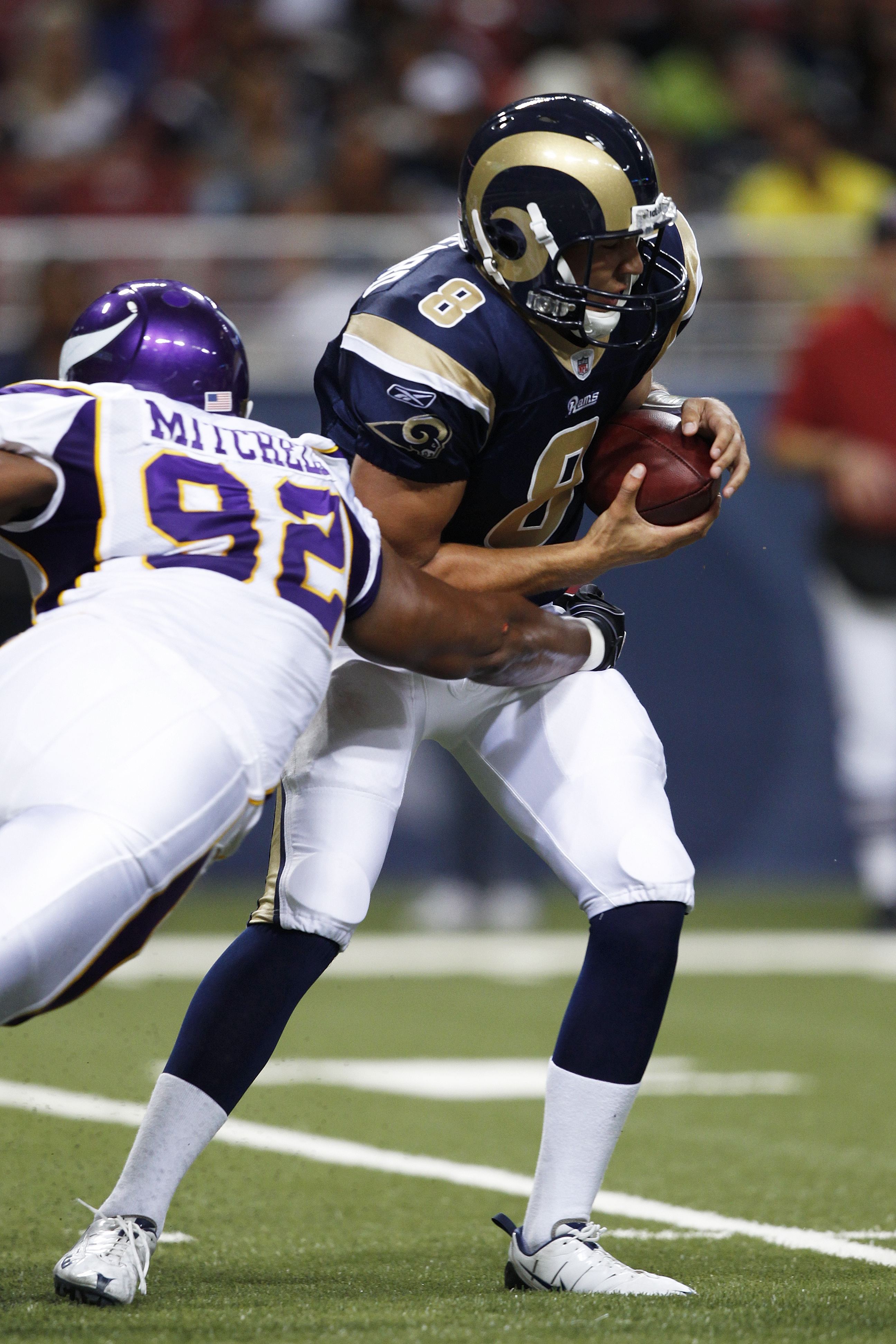ST. LOUIS, MO - AUGUST 14: Sam Bradford #8 of the St. Louis Rams gets sacked by Jayme Mitchell #92 of the Minnesota Vikings during the preseason game at Edward Jones Dome on August 14, 2010 in St. Louis, Missouri. (Photo by Joe Robbins/Getty Images)