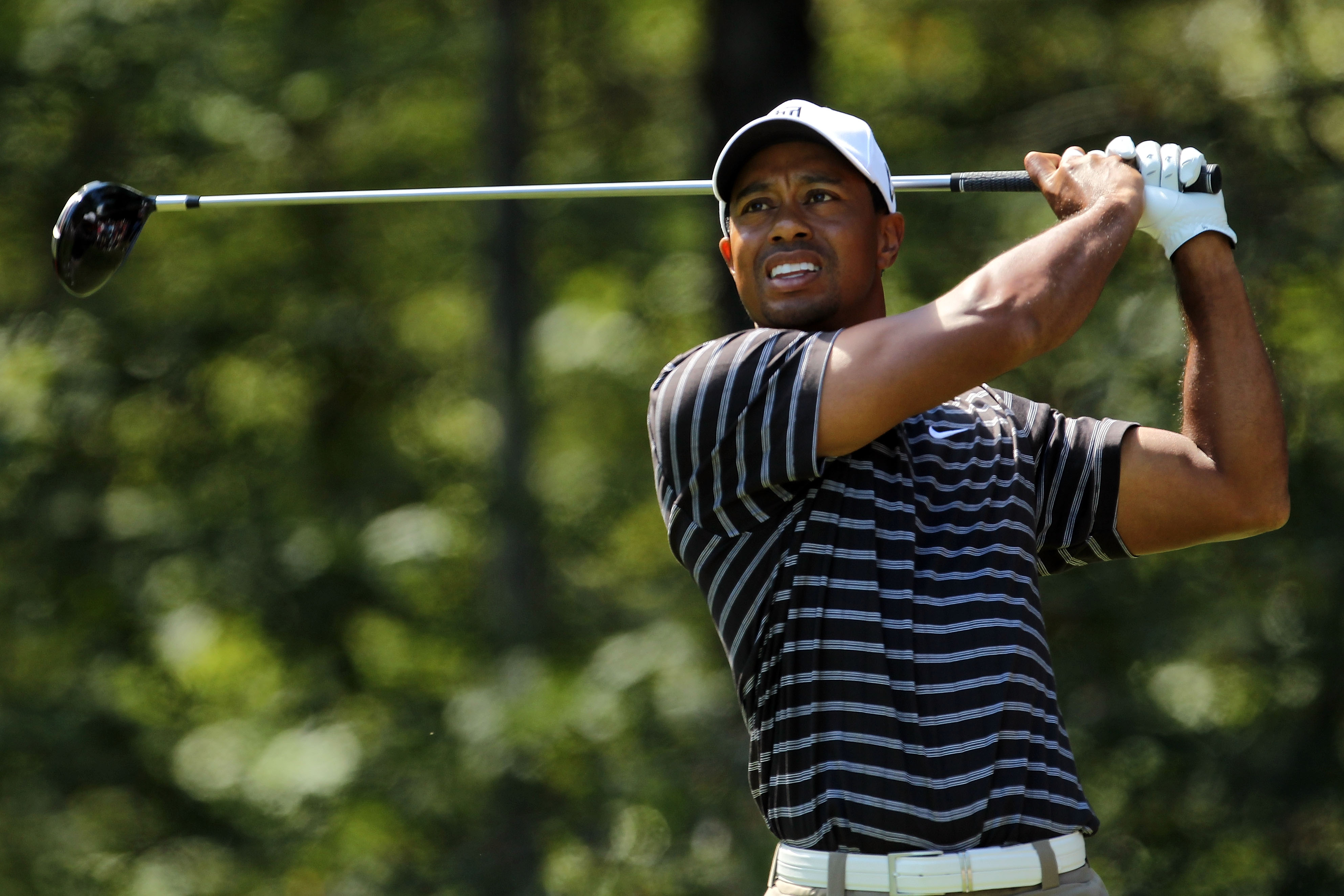 NORTON, MA - SEPTEMBER 05:  Tiger Woods tees off on the second hole during the third round of the Deutsche Bank Championship at TPC Boston on September 5, 2010 in Norton, Massachusetts.  (Photo by Mike Ehrmann/Getty Images)