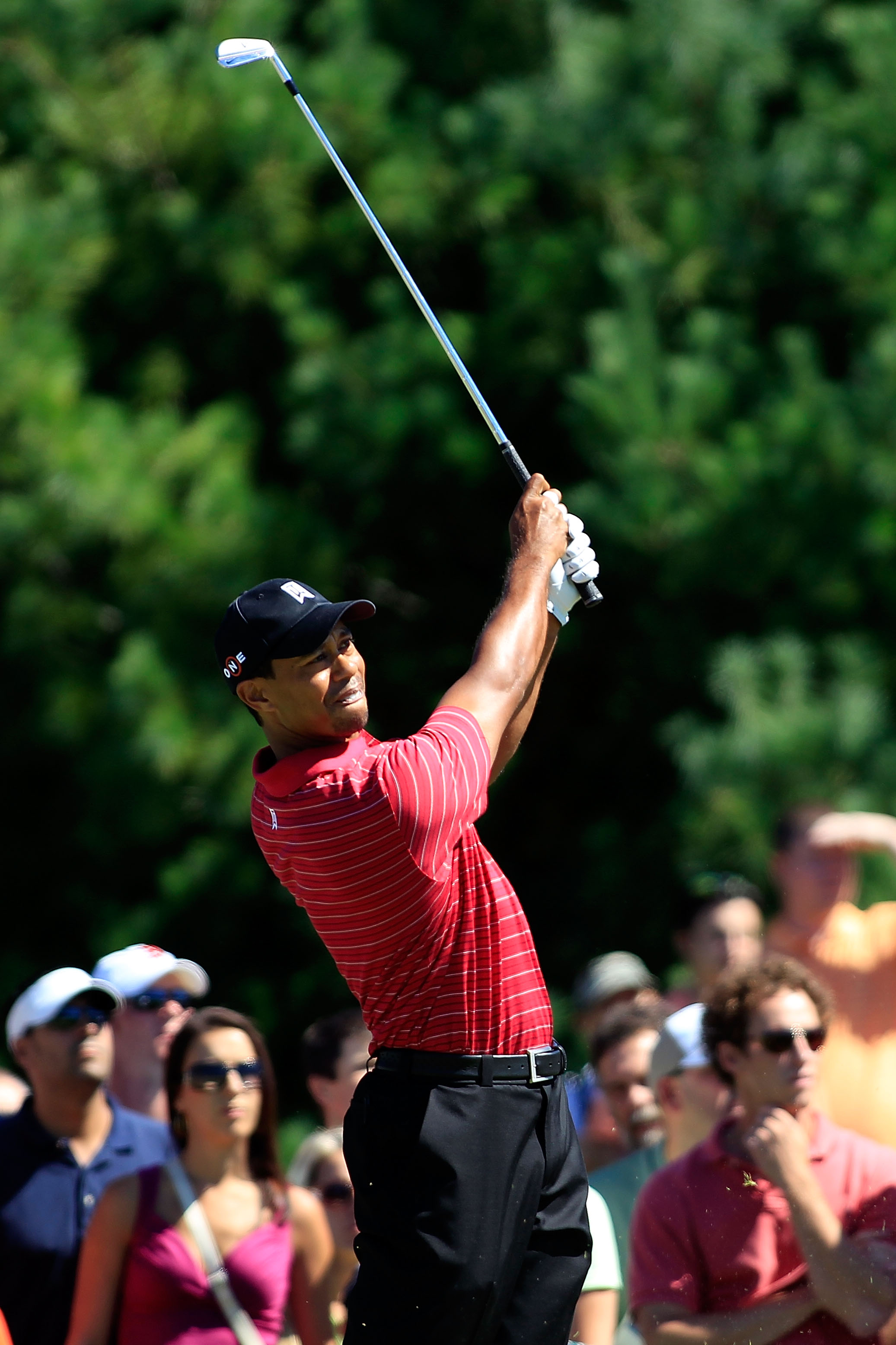 NORTON, MA - SEPTEMBER 06:  Tiger Woods hits a tee shot on the third hole during the final round of the Deutsche Bank Championship at TPC Boston on September 6, 2010 in Norton, Massachusetts.  (Photo by Michael Cohen/Getty Images)