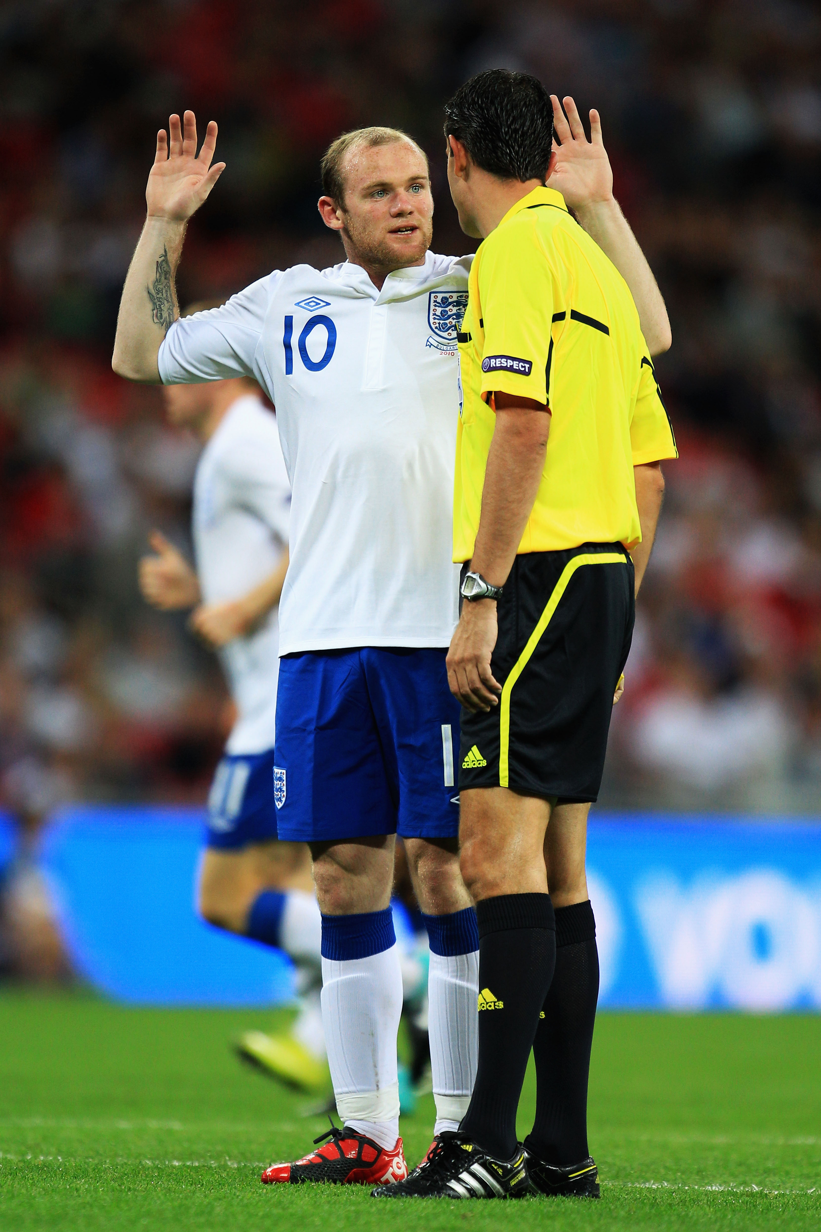 LONDON, ENGLAND - SEPTEMBER 03:  Wayne Rooney of England appeals to match referee Viktor Kassai of Hungary during the UEFA EURO 2012 Group G Qualifying match between England and Bulgaria at Wembley Stadium on September 3, 2010 in London, England.  (Photo
