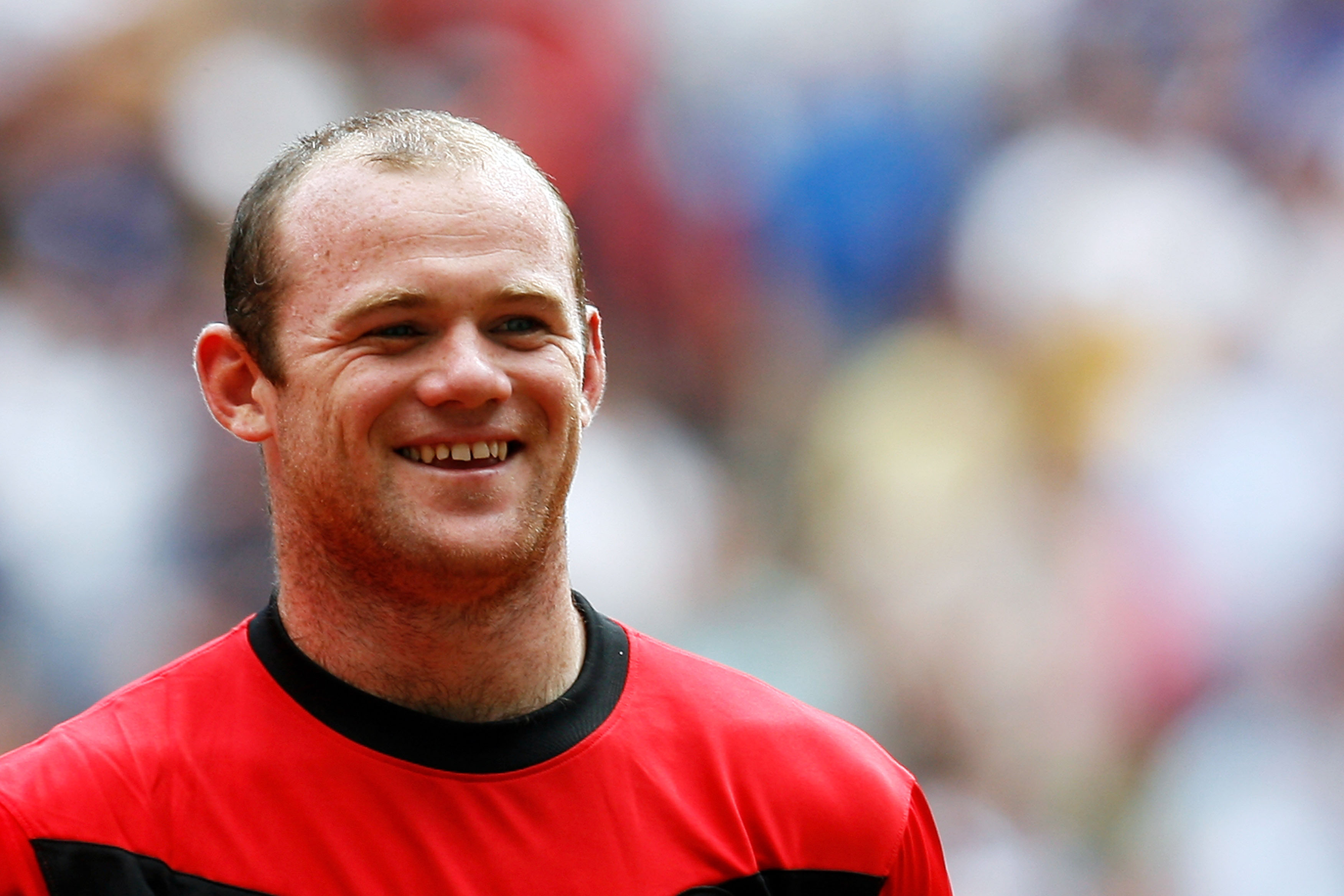 LONDON, ENGLAND - AUGUST 09:  Wayne Rooney of Manchester United smiles prior to the FA Community Shield match between Manchester United and Chelsea at Wembley Stadium on August 9, 2009 in London, England.  (Photo by Paul Gilham/Getty Images)