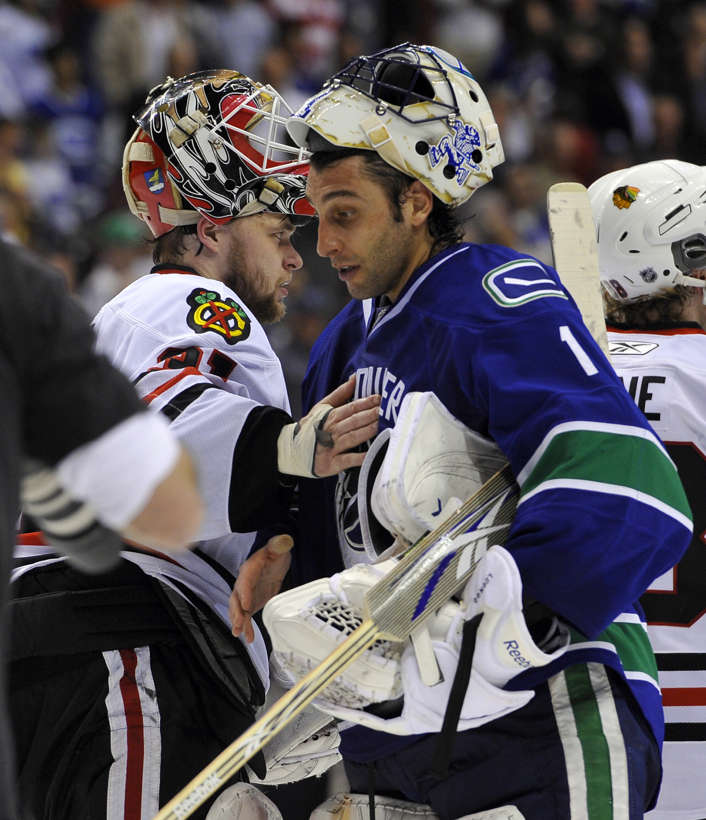 VANCOUVER, CANADA - MAY 11:  Goalie Roberto Luongo #1 of the Vancouver Canucks and goalie Antti Niemi #31 of the Chicago Blackhawks shake hands after the Blackhawks defeated the Canucks 5-1 to win Game Six of the Western Conference Semifinals to win the s