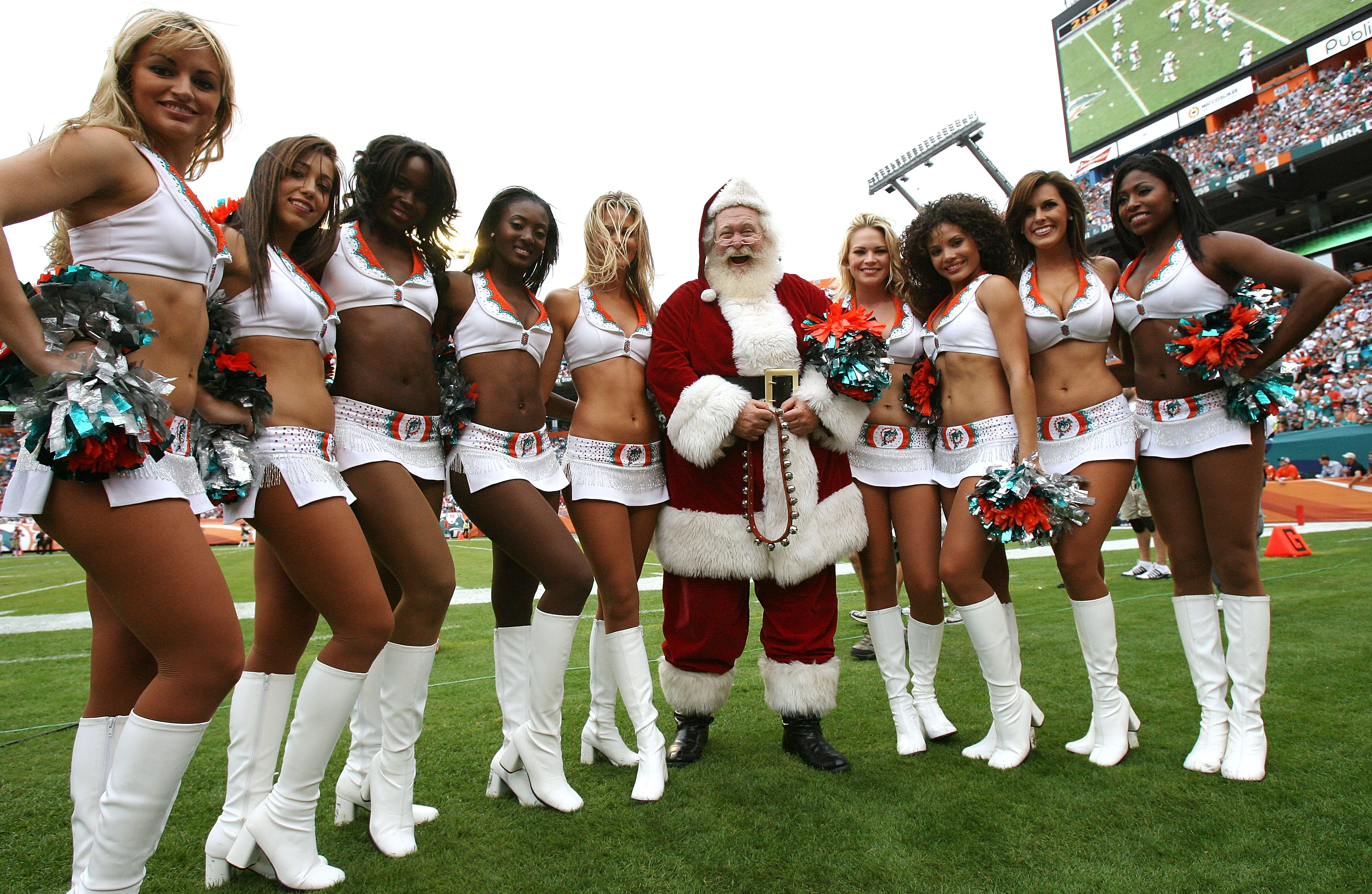 Miami Gardens, Florida, USA. 23rd Dec, 2018. A Miami Dolphins cheerleader  performs in a christmas themed outfit during an NFL football game between  the Jacksonville Jaguars and the Miami Dolphins at the