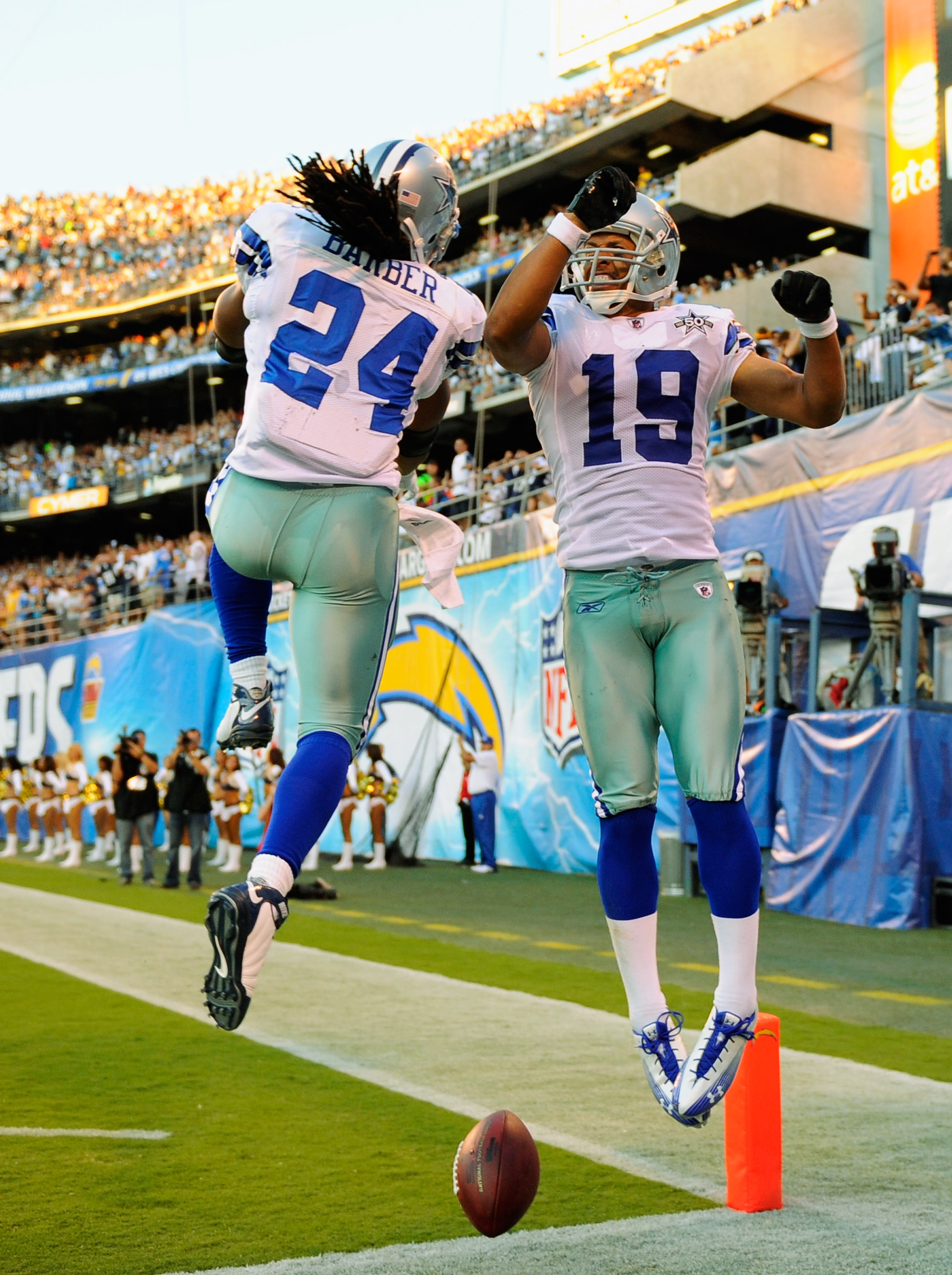 16 August 2008 - Miles Austin (19) of the Dallas Cowboys celebrates his  touchdown catch during the Cowboys preseason game with the Denver Broncos  at Invesco Field at Mile High Stadium in