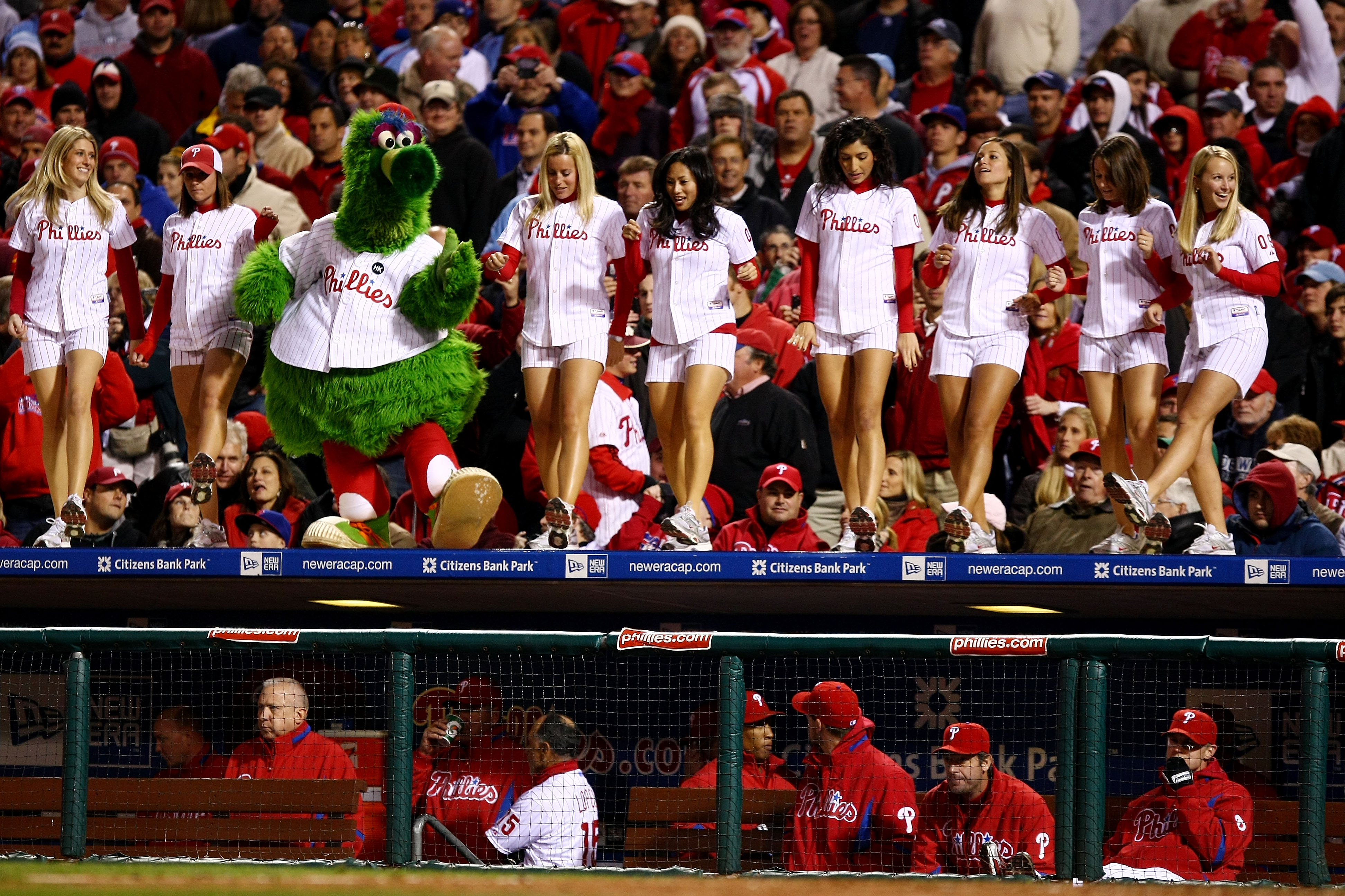 PHILADELPHIA - OCTOBER 19:  The Philly Phanatic, mascot for the Philadelphia Phillies performs on top of the Phillies dugout against the Los Angeles Dodgers in Game Four of the NLCS during the 2009 MLB Playoffs at Citizens Bank Park on October 19, 2009 in