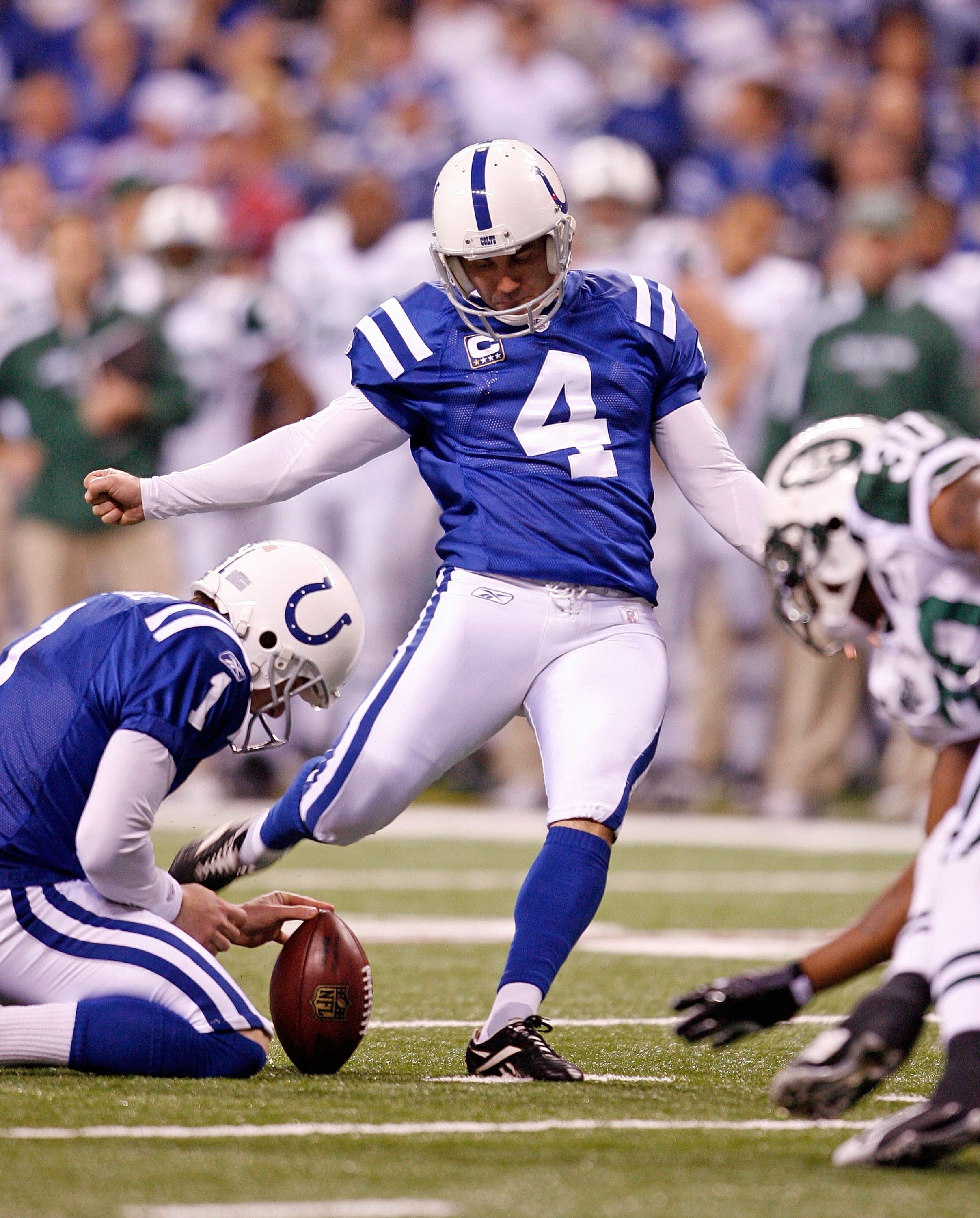 INDIANAPOLIS - DECEMBER 27:  Adam Vinatieri #4 of the Indianapolis Colts kicks a field goal during the NFL game against the New York Jets at Lucas Oil Stadium on December 27, 2009 in Indianapolis, Indiana.  (Photo by Andy Lyons/Getty Images)