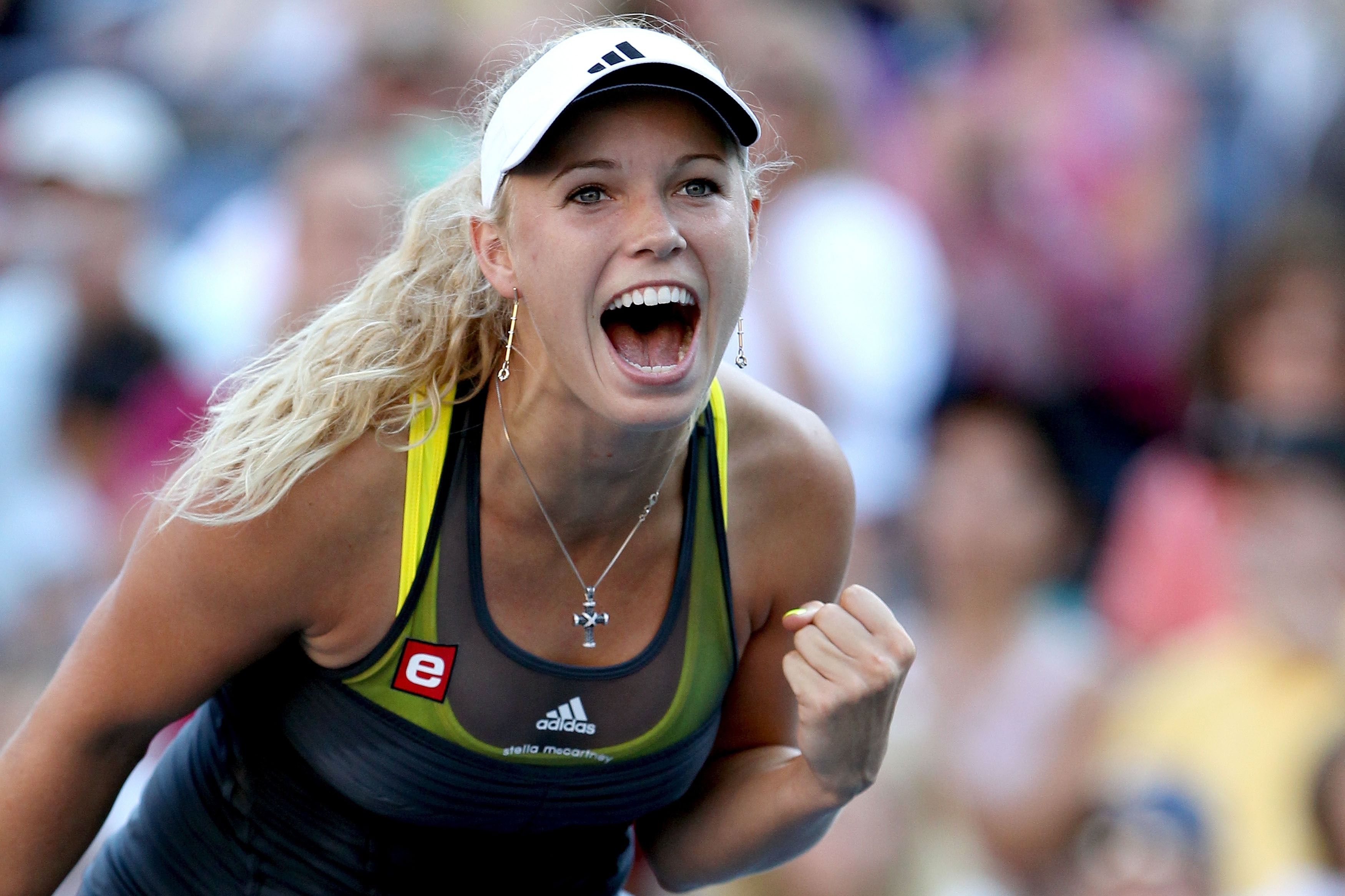 NEW YORK - SEPTEMBER 06:  Caroline Wozniacki of Denmark celebrates match point against Maria Sharapova of Russia during the women's singles match on day eight of the 2010 U.S. Open at the USTA Billie Jean King National Tennis Center on September 6, 2010 i