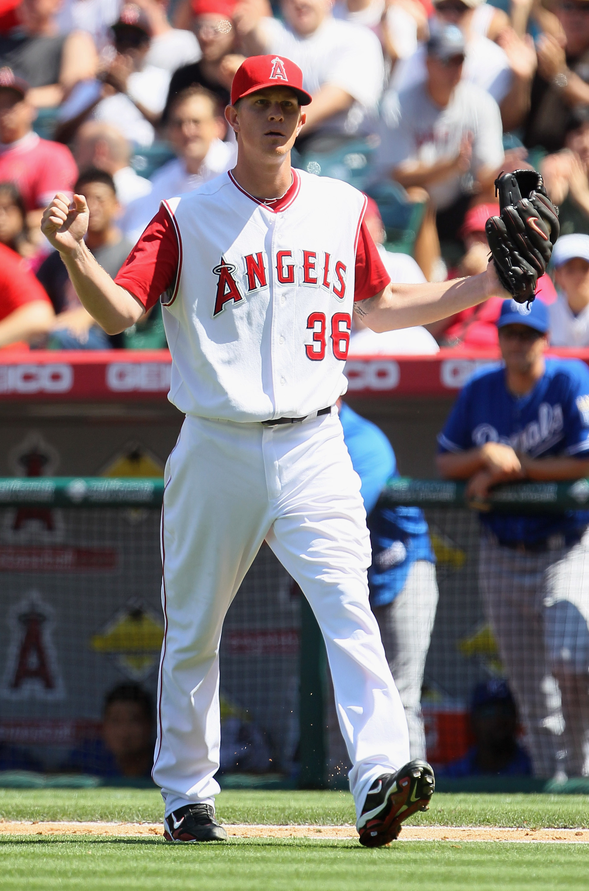 ANAHEIM, CA - AUGUST 11:  Pitcher Jered Weaver #36 of the Los Angeles Angels of Anaheim pumps his fist after getting Alex Gordon #4 of the Kansas City Royals to ground out in the eighth inning at Angel Stadium on August 11, 2010 in Anaheim, California. Th