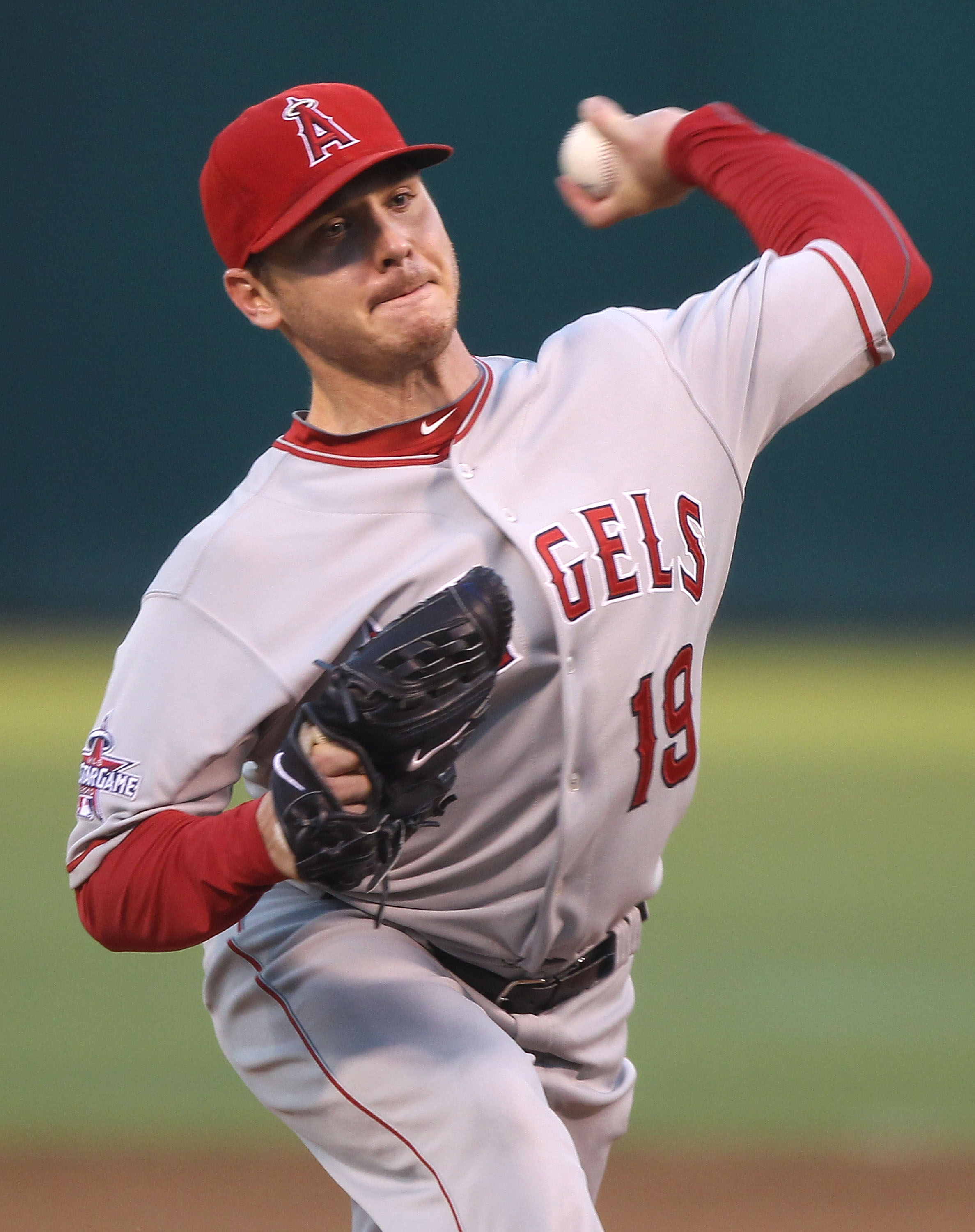 OAKLAND, CA - SEPTEMBER 03:  Scott Kazmir #19 of the Los Angeles Angels of Anaheim pitches against the Oakland Athletics during a Major League Baseball game at the Oakland-Alameda County Coliseum on September 3, 2010 in Oakland, California.  (Photo by Jed