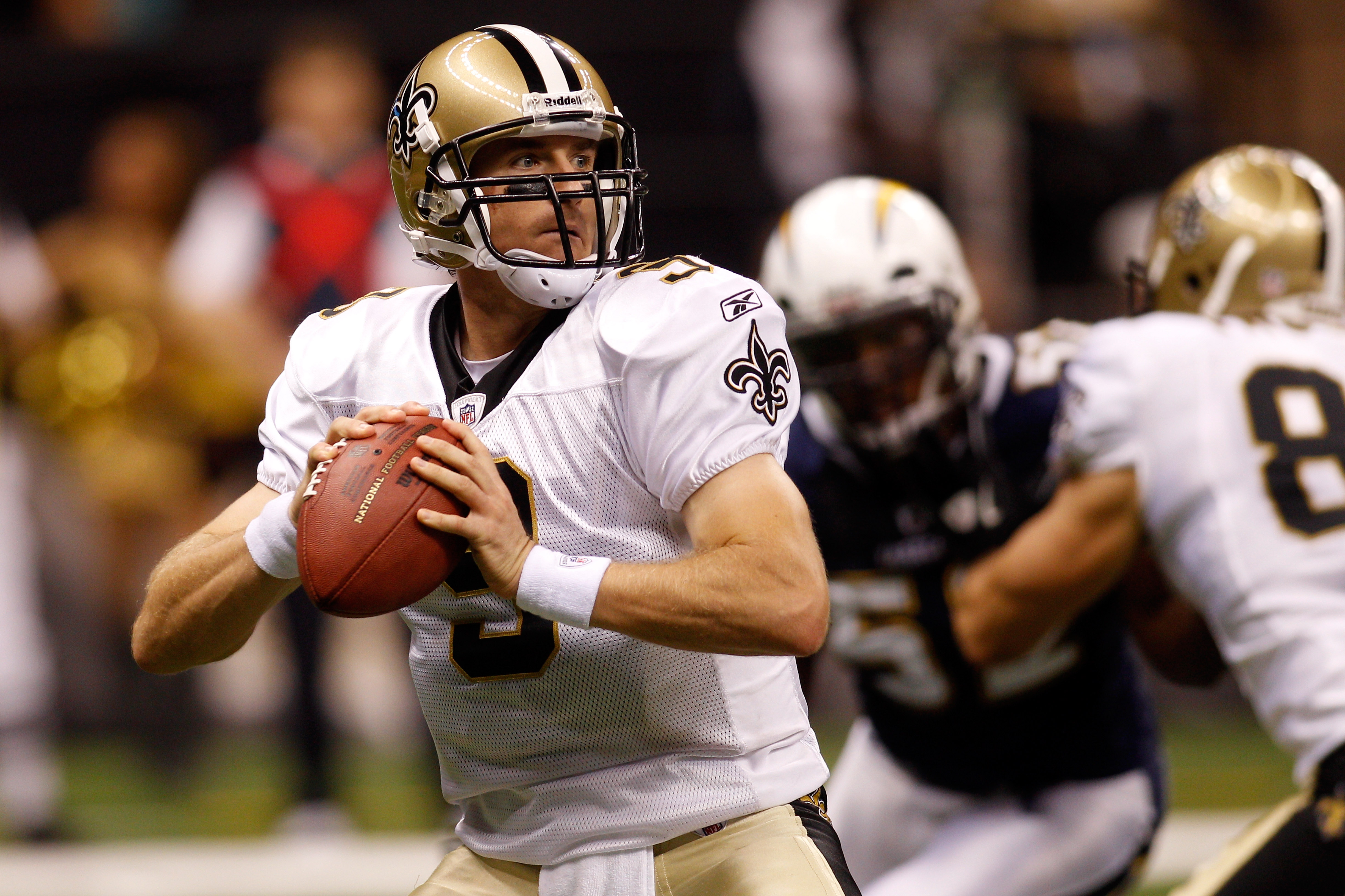 NEW ORLEANS - AUGUST 27:  Drew Brees #9 of the New Orleans Saints in action against the San Diego Chargers at the Louisiana Superdome on August 27, 2010 in New Orleans, Louisiana.  (Photo by Chris Graythen/Getty Images)