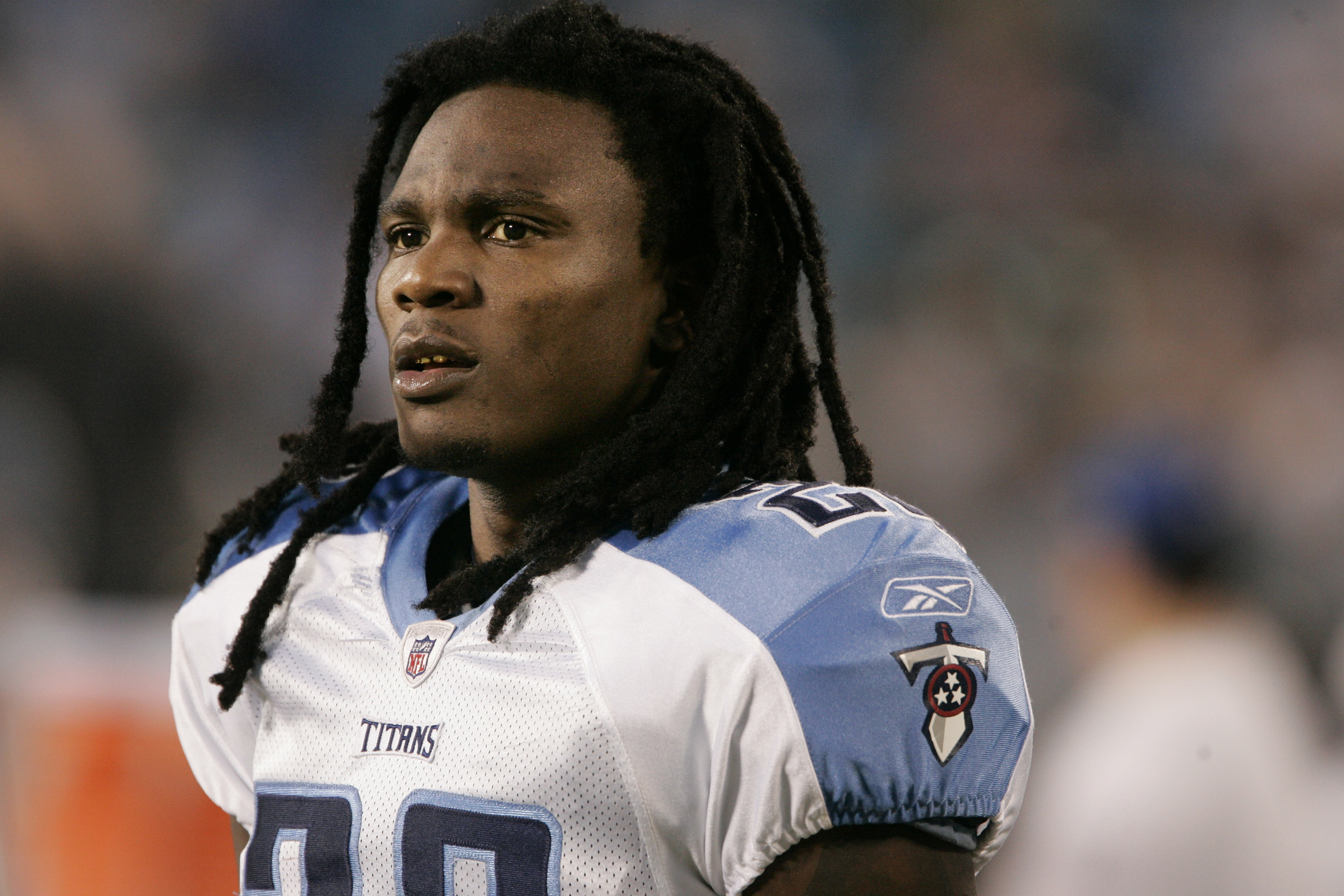 CHARLOTTE, NC - AUGUST 28:  Runningback Chris Johnson #28 of the Tennessee Titans walks on the sidelines before  the start of their preseason game against the Carolina Panthers at Bank of America Stadium on August 28, 2010 in Charlotte, North Carolina. (P