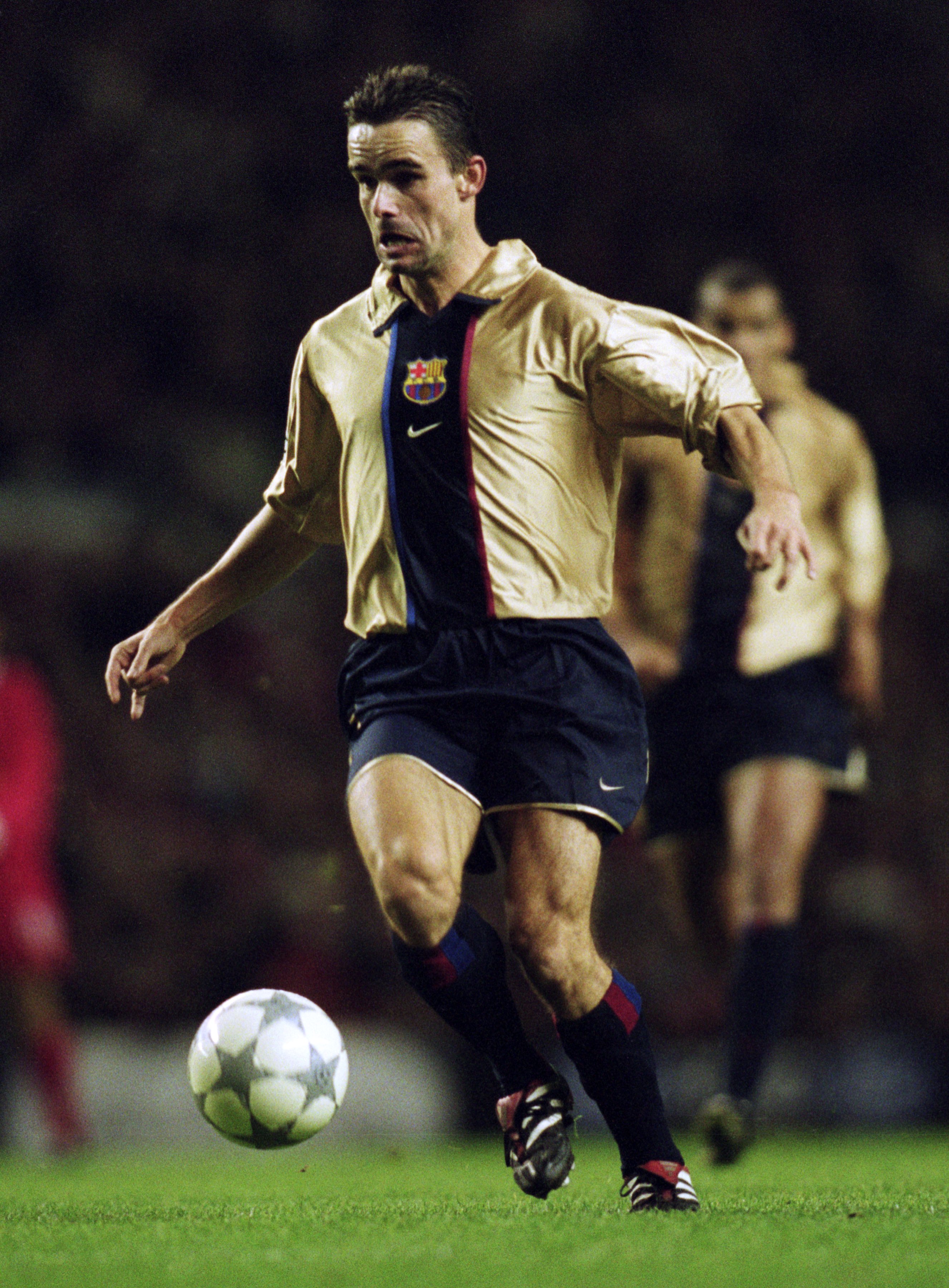 20 Nov 2001:  Marc Overmars of Barcelona runs with the ball during the UEFA Champions League Group B match against Liverpool played at Anfield, in Liverpool, England. Barcelona won the match 3-1. \ Mandatory Credit: Gary M Prior /Allsport