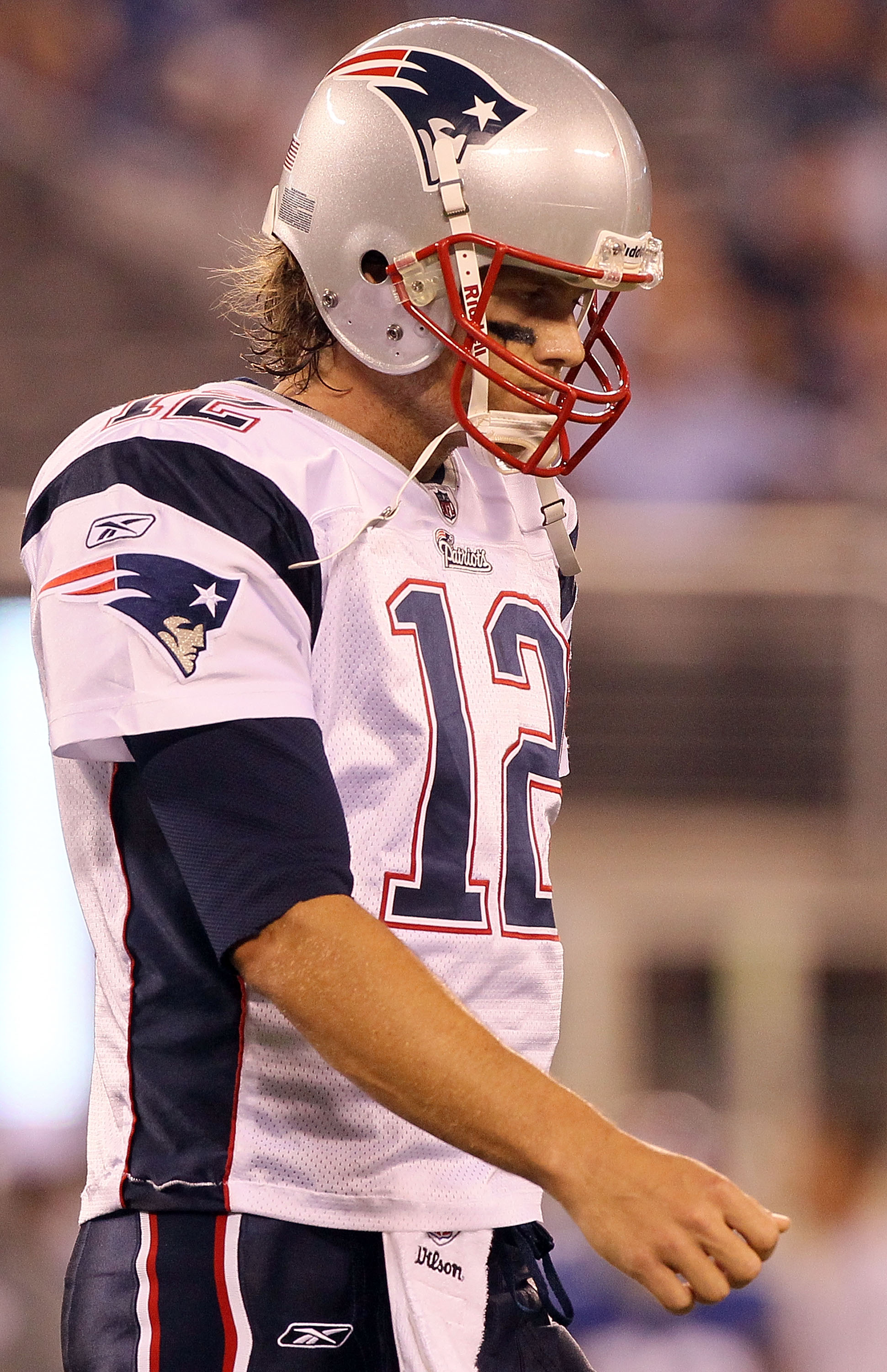 EAST RUTHERFORD, NJ - SEPTEMBER 02:  Tom Brady #12 of the New England Patriots walks to the sideline after throwing an interception against the New York Giants on September 2, 2010 at the New Meadowlands Stadium in East Rutherford, New Jersey.  (Photo by 