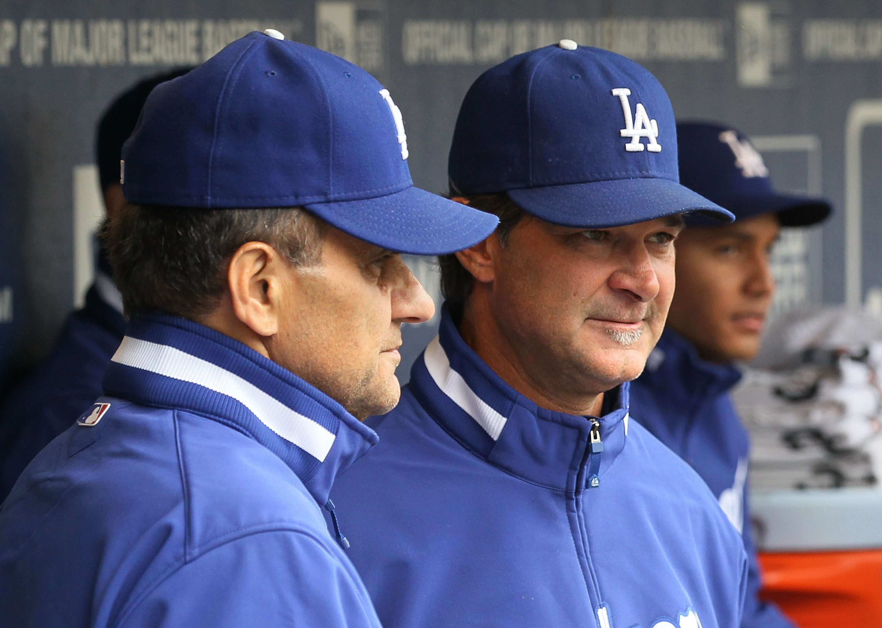 NEW YORK - APRIL 28:  Manager Joe Torre and hitting coach Don Mattingly of the Los Angeles Dodgers look on before their game against the New York Mets on April 28, 2010 at Citi Field in the Flushing neighborhood of the Queens borough of New York City.  (P