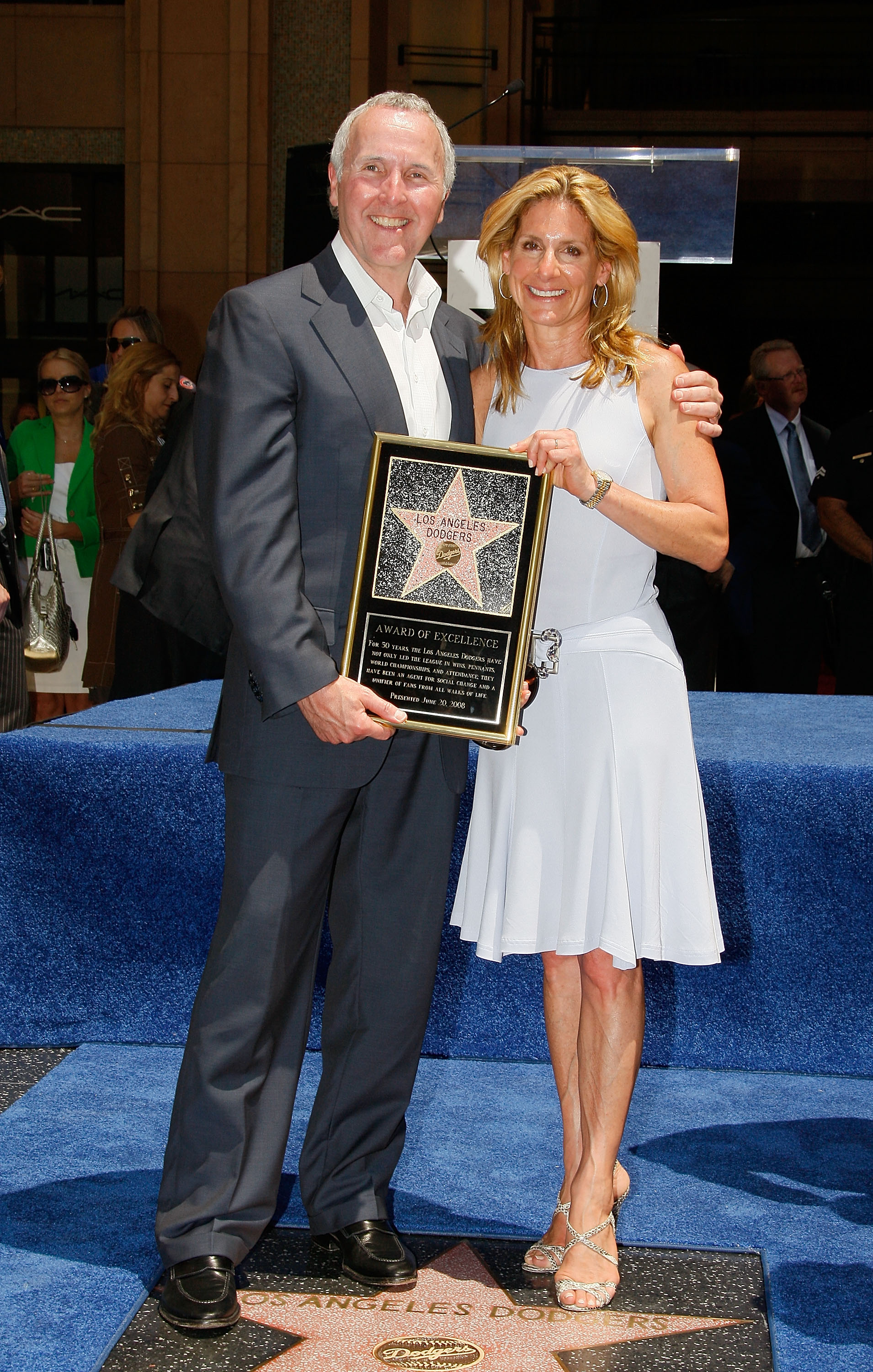 HOLLYWOOD - JUNE 20:  Team owner Frank McCourt (L) and wife Jamie attend a special star ceremony honoring the Los Angeles Dodgers with an Award of Excellence on the Hollywood Walk of Fame on June 20, 2008 in Hollywood, California.  (Photo by Vince Bucci/G