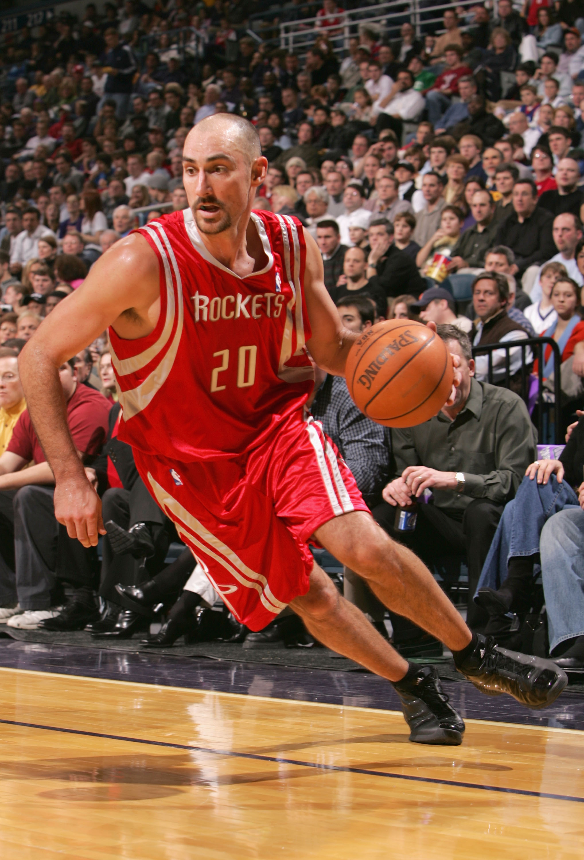 MILWAUKEE, WI - DECEMBER 28:  Jon Barry #20 of the Houston Rockets drives with the ball during the game against the Milwaukee Bucks on December 28, 2004 at Bradley Center in Milwaukee, Wisconsin. The Bucks defeated the Rockets 115-87. NOTE TO USER: User e