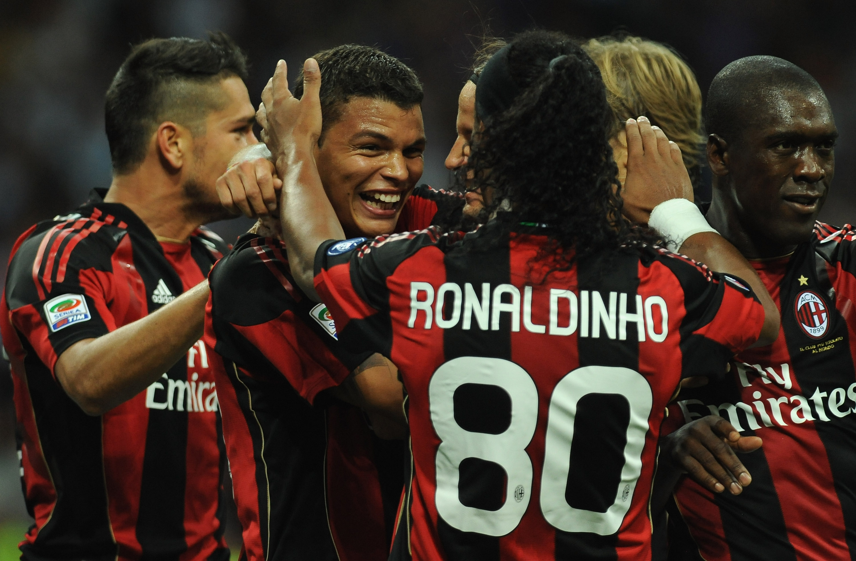 MILAN, ITALY - AUGUST 29:  Thiago Silva (C) of AC Milan celebrates with his team mates after scoring during the Serie A match between AC Milan and US Lecce at Stadio Giuseppe Meazza on August 29, 2010 in Milan, Italy.  (Photo by Valerio Pennicino/Getty Im