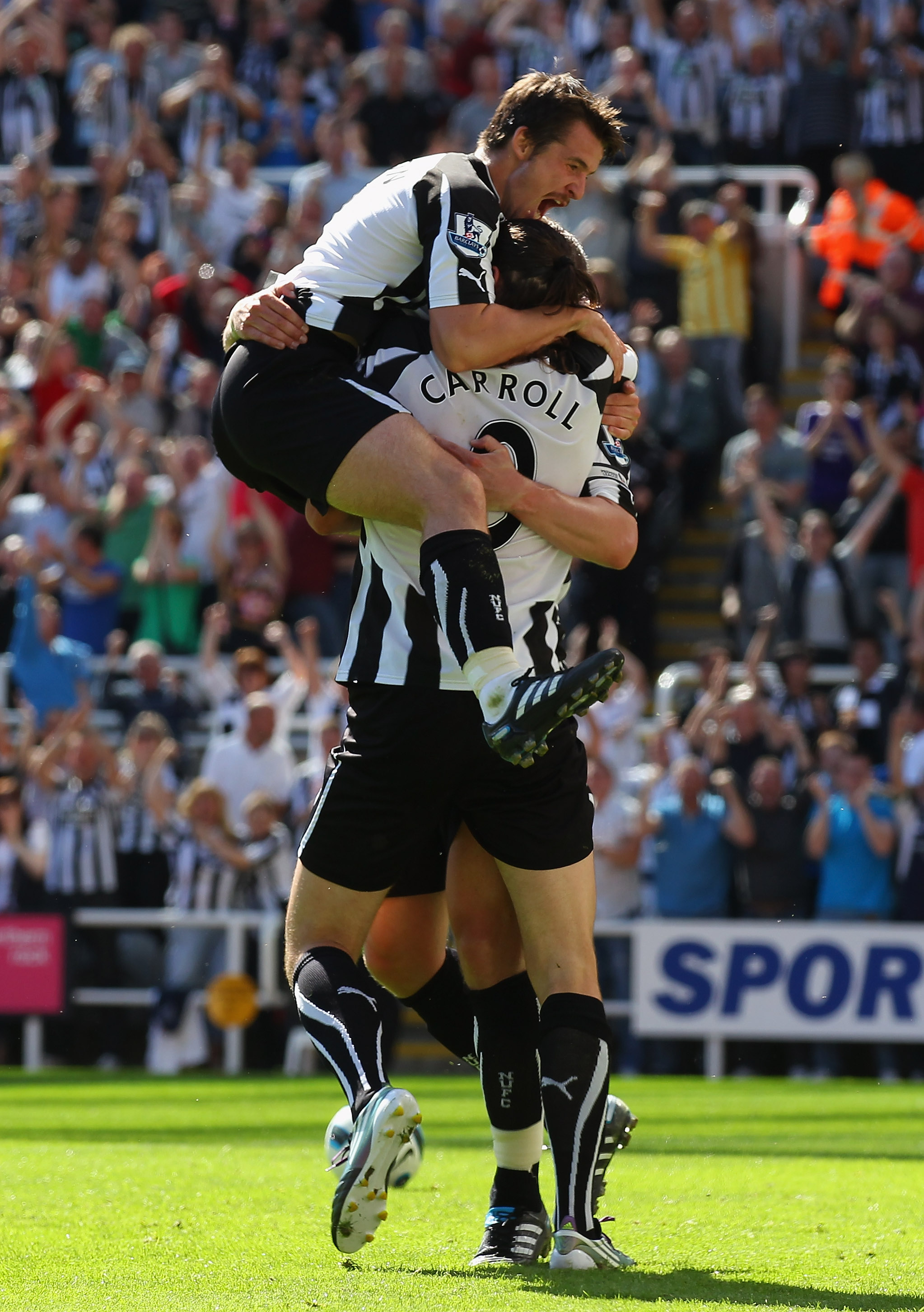 NEWCASTLE UPON TYNE, ENGLAND - AUGUST 22:  Kevin Nolan of Newcastle United celebrates his goal with Joey Barton and Andy Carroll during the Barclays Premier League match between Newcastle United and Aston Villa at St James' Park on August 22, 2010 in Newc
