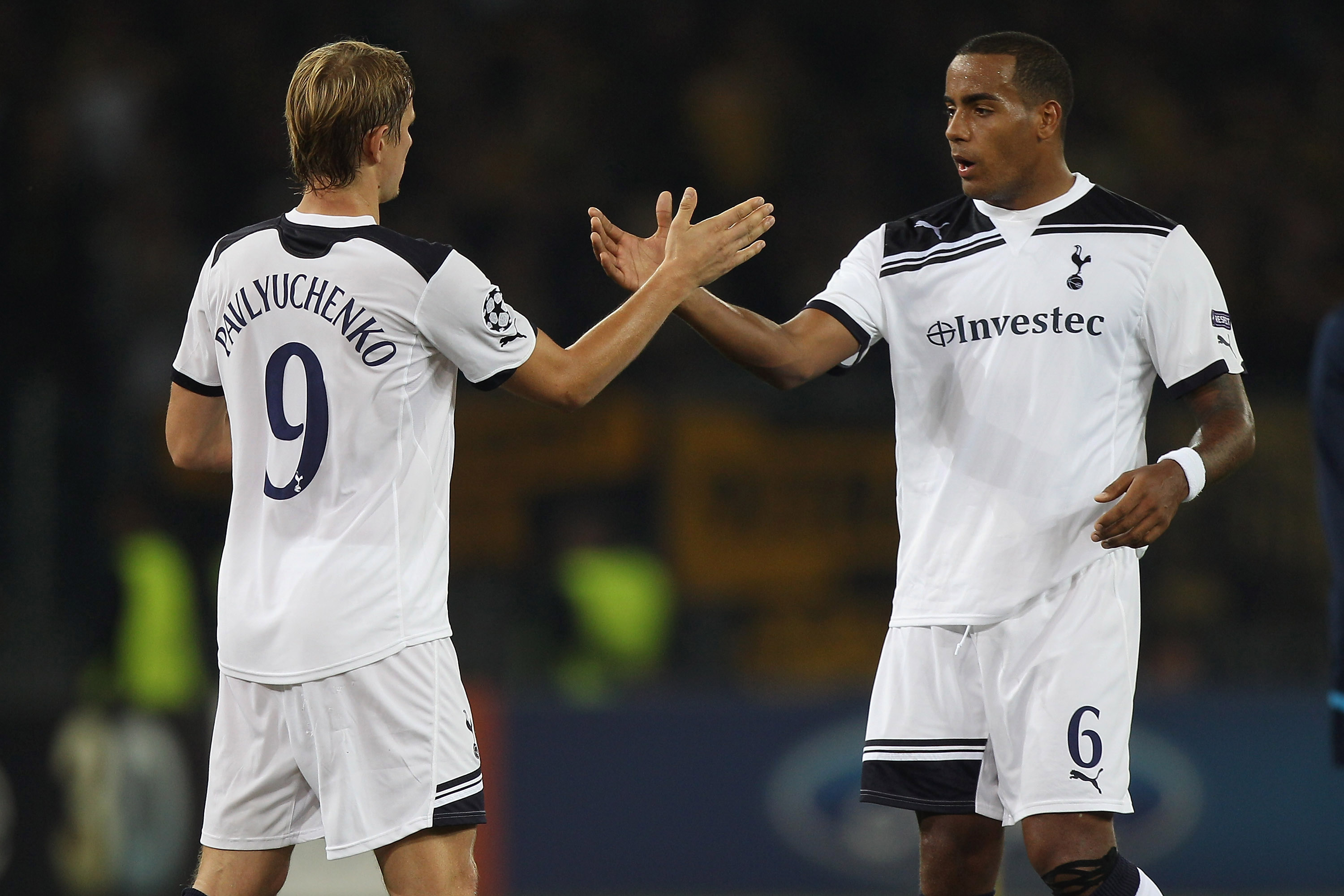 BERNE, SWITZERLAND - AUGUST 17:  Roman Pavlyuchenko (l) of Tottenham shakes hands with Tom Huddlestone (r) after the final whistle during the UEFA Champions League Play-Off first leg match between BSC Young Boys and Tottenham Hotspur at the Stade de Suiss
