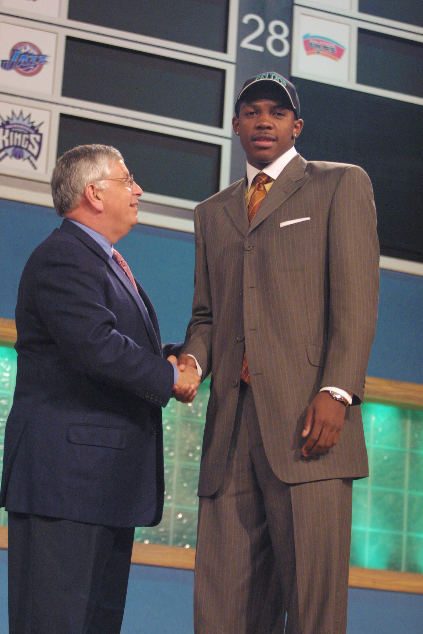 27 Jun 2001: Joe Johnson of Arkansas is greeted by NBA Commissioner Davd Stern after being picked 10th in the NBA Draft by the Boston Celtics at Madison Square Garden in New York City. Mandatory Credit: Al Bello/ALLSPORT NOTE TO USER: It is expressly unde